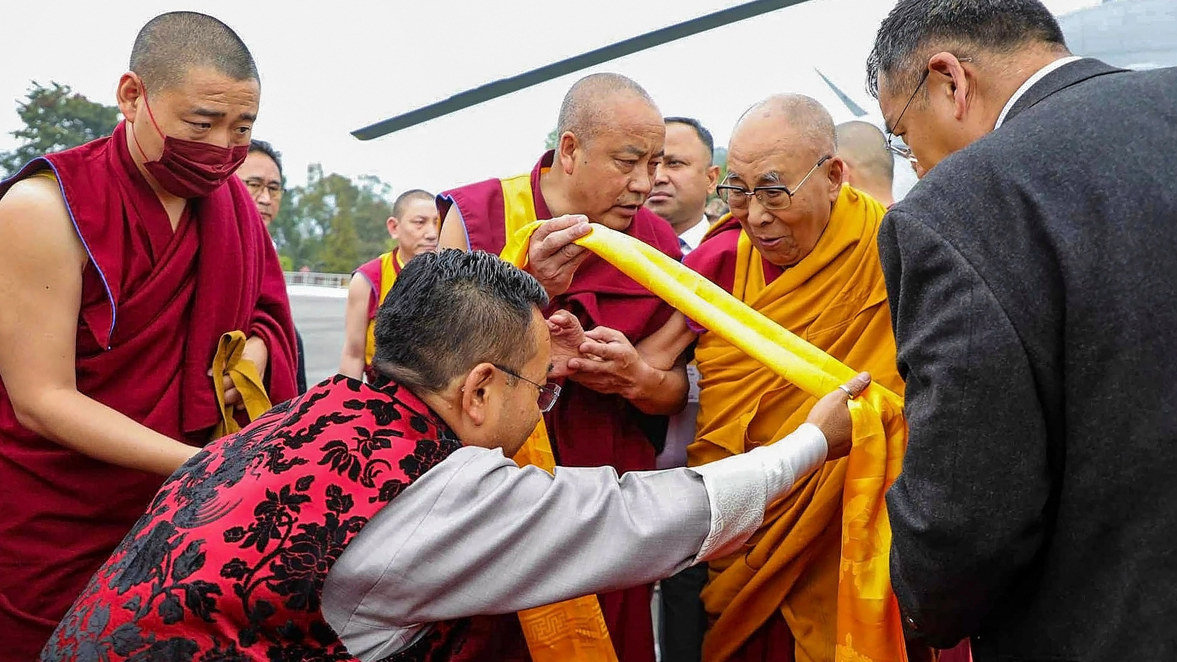 <div class="paragraphs"><p>East Sikkim: Sikkim Chief Minister Prem Singh Tamang receives Tibetan spiritual leader the Dalai Lama upon the latter's arrival in East Sikkim, Monday, Dec. 11, 2023.</p></div>