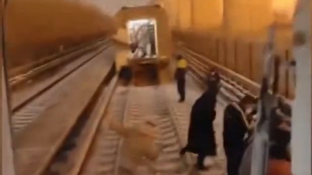 <div class="paragraphs"><p>Screengrab from the video showing people running helter-skelter after the trains collided.</p></div>