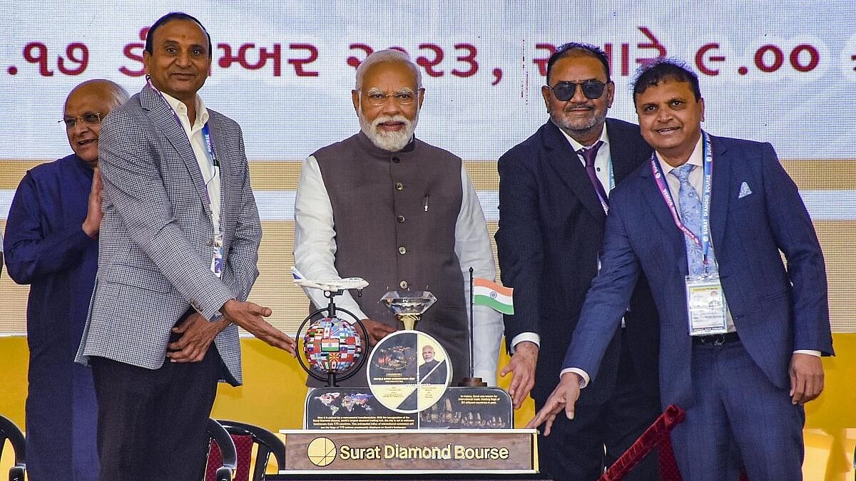 <div class="paragraphs"><p>Prime Minister Narendra Modi being garlanded at the inauguration of the Surat Diamond Bourse, in Surat.&nbsp;</p></div>