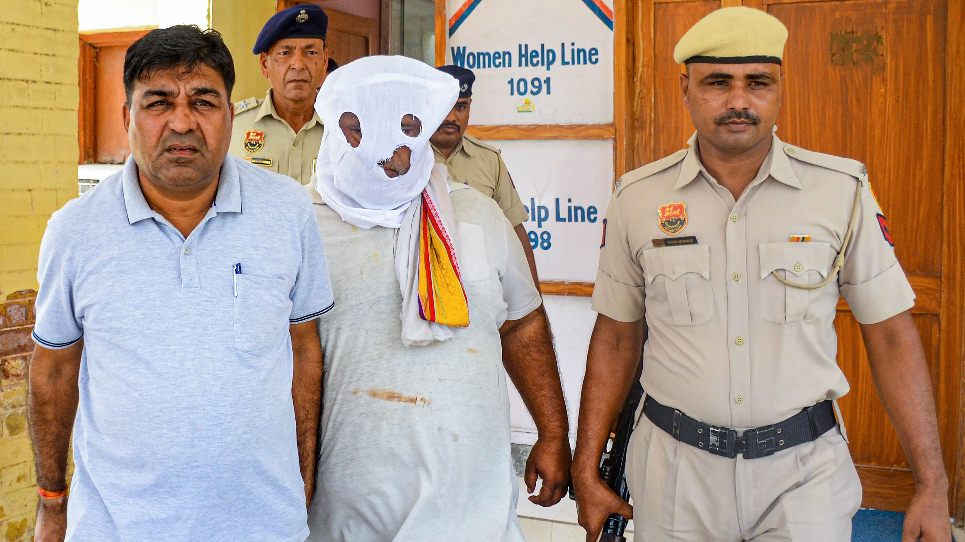 <div class="paragraphs"><p>Cow vigilante Bittu Bajrangi being presented before the Nuh district court a day after his arrest, Aug 16, 2023.</p></div>