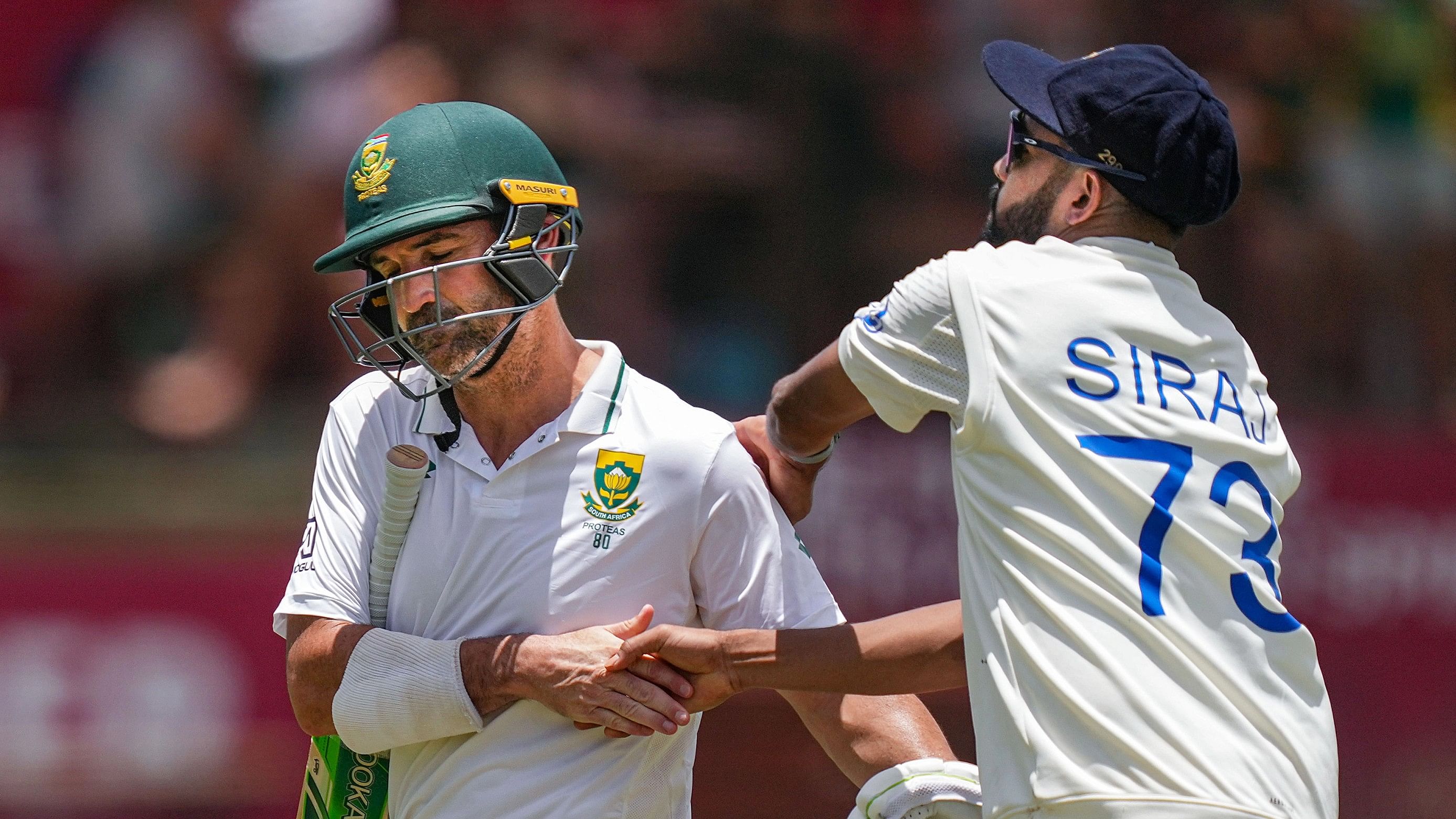 <div class="paragraphs"><p>South Africa's Dean Elgar being greeted by India's Mohammad Siraj for his innings as he leaves the ground on the third day of the first Test cricket match between India and South Africa, at SuperSport Park Stadium, in Centurion.</p></div>