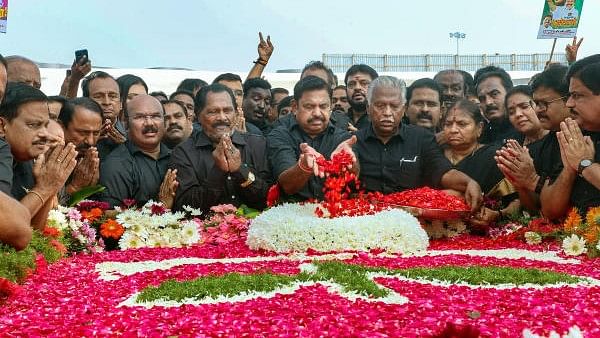 <div class="paragraphs"><p>AIADMK interim General Secretary Edappadi K Palaniswami with party workers pays tribute to former Tamil Nadu chief minister J Jayalalithaa on her death anniversary, at her memorial in Chennai, Monday, Dec. 5, 2022.</p></div>