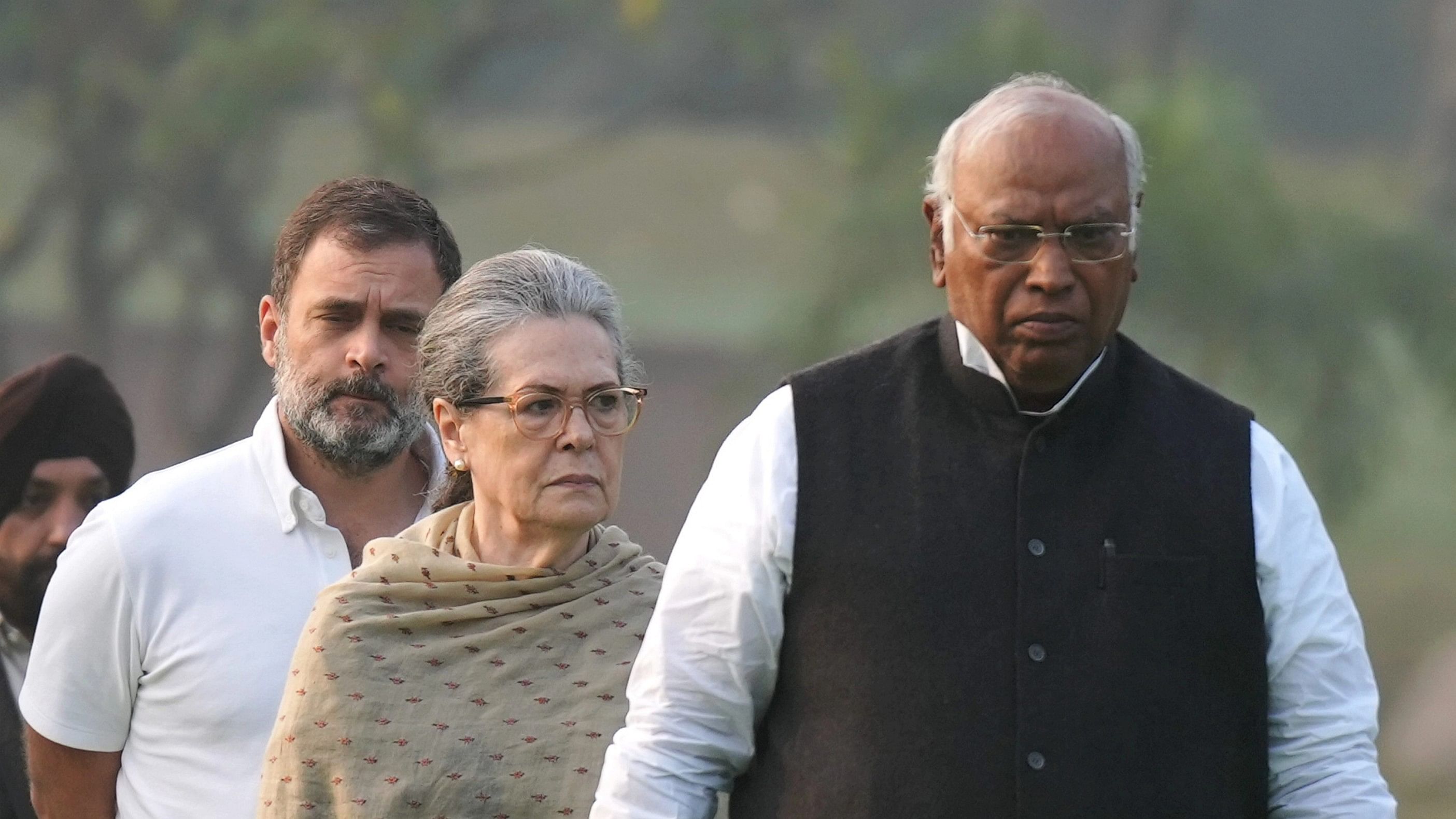 <div class="paragraphs"><p>Congress President Mallikarjun Kharge with party leaders Sonia Gandhi and Rahul Gandhi</p></div>