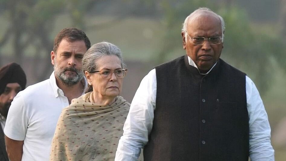 <div class="paragraphs"><p>Congress President Mallikarjun Kharge with party leaders Sonia Gandhi and Rahul Gandhi</p></div>