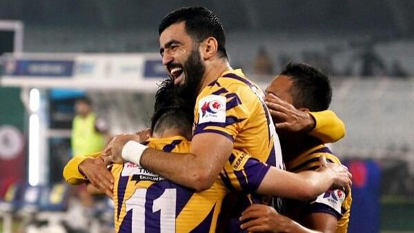 <div class="paragraphs"><p>Odisha FC's Ahmed Jahouh celebrates with teammates after scoring a goal during the ISL.</p></div>