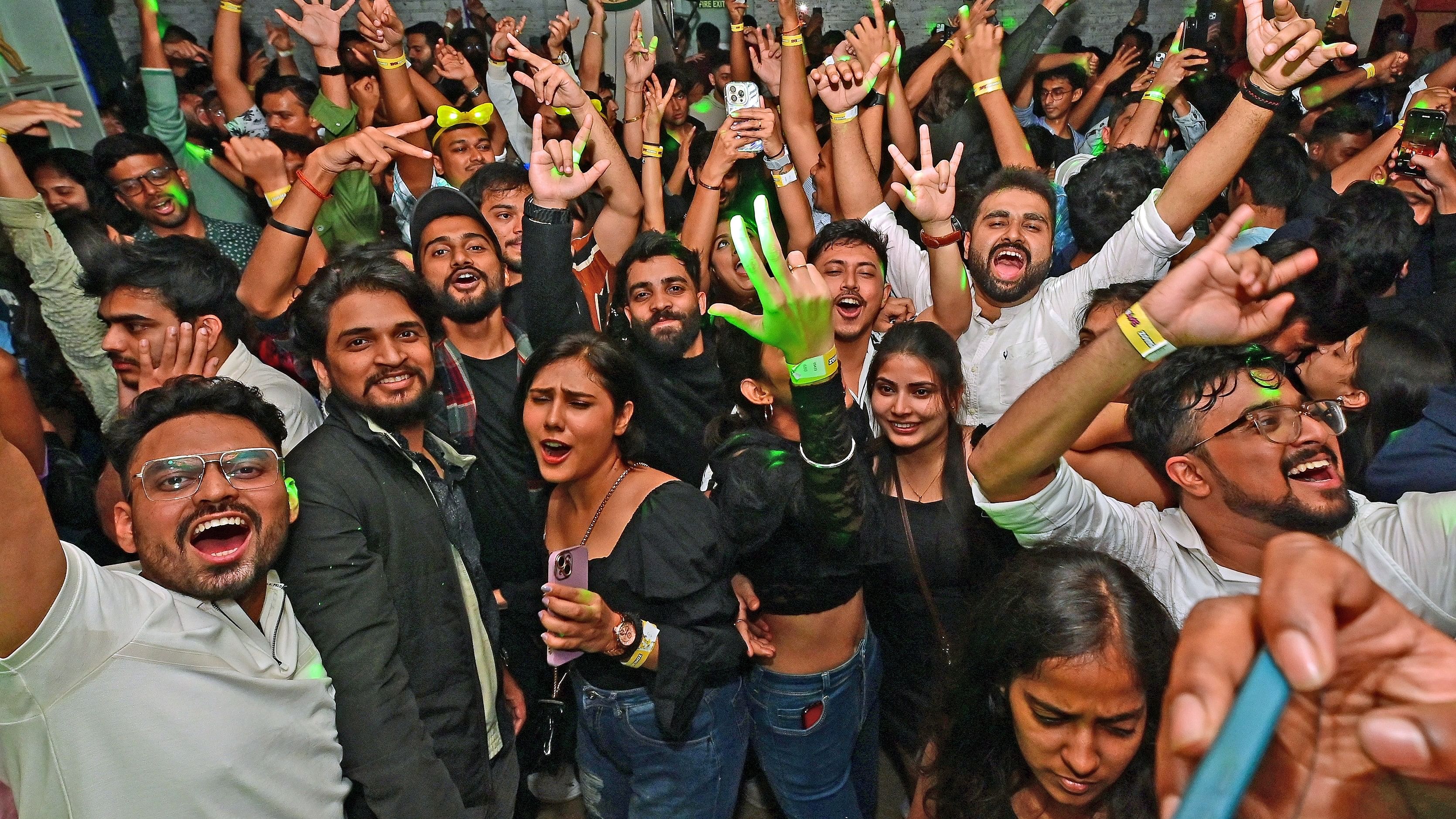 <div class="paragraphs"><p>The party scene at a pub in Bengaluru's Church Street on New Year's Eve on Sunday. </p></div>