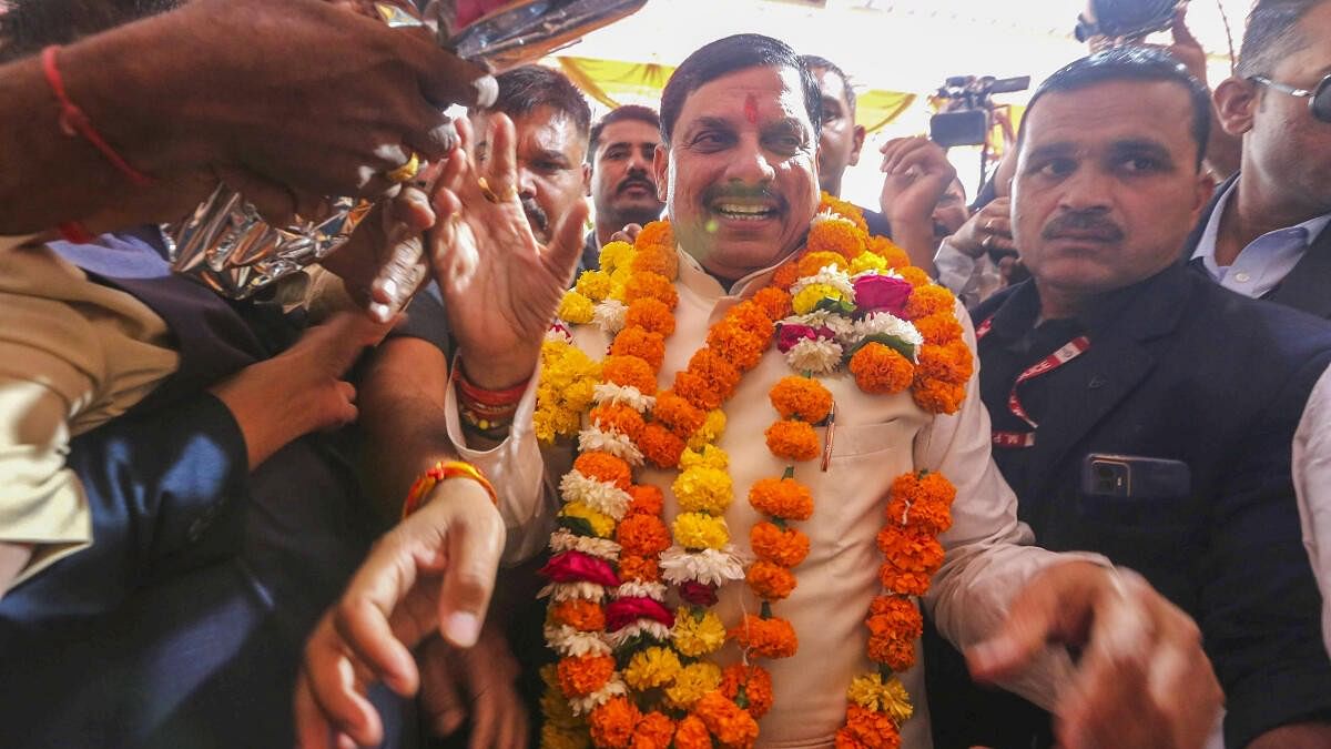 <div class="paragraphs"><p>Madhya Pradesh Chief Minister-designate Mohan Yadav being greeted by party workers at BJP Headquarters in Bhopal.</p></div>