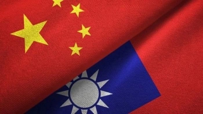 <div class="paragraphs"><p>Taiwan and China flags.</p></div>