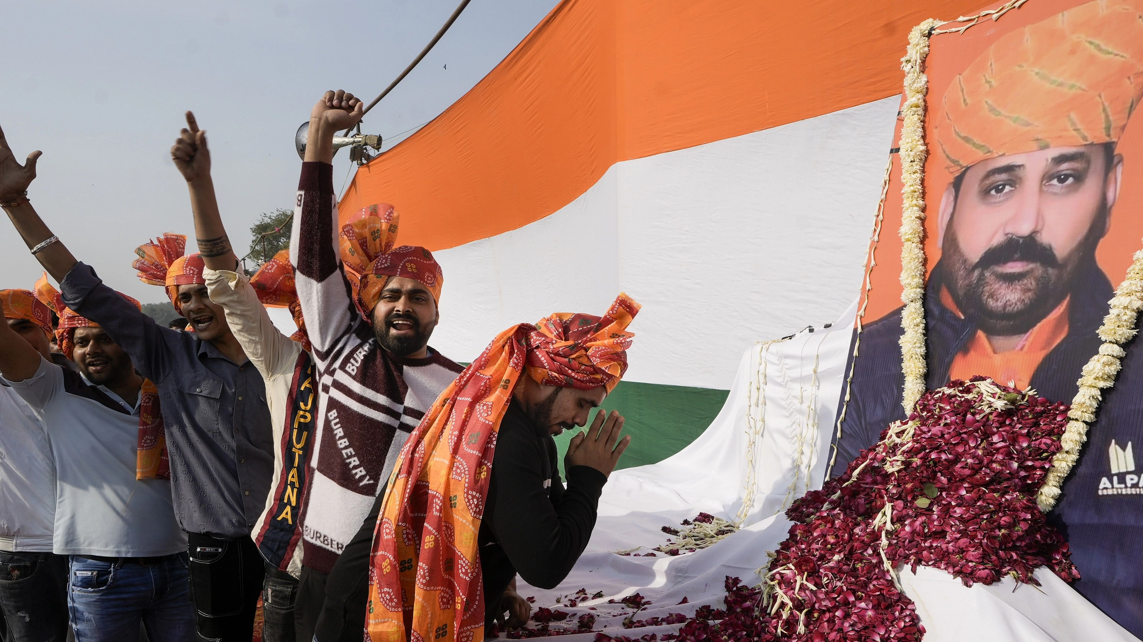 <div class="paragraphs"><p>People from the Rajput community pay tribute to Shree Rajput Karni Sena's Sukhdev Singh Gogamedi during a protest against his killing, at Ramlila Maidan, in New Delhi.</p></div>