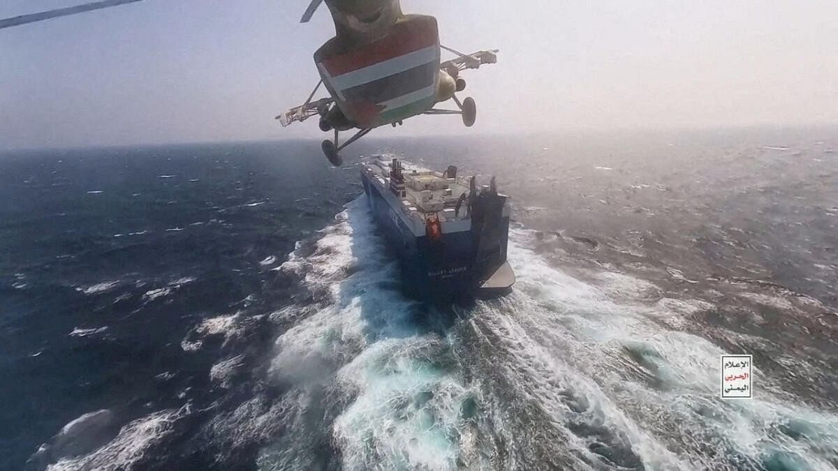 <div class="paragraphs"><p>Houthi military helicopter over the Galaxy Leader cargo ship in the Red Sea.</p></div>