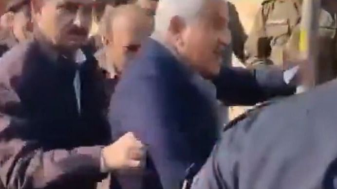<div class="paragraphs"><p>Screengrab from the video posted on X by&nbsp;Pakistan Tehreek-e-Insaf showing&nbsp;Shah Mahmood Qureshi being pushed by police in Pakistan</p></div>