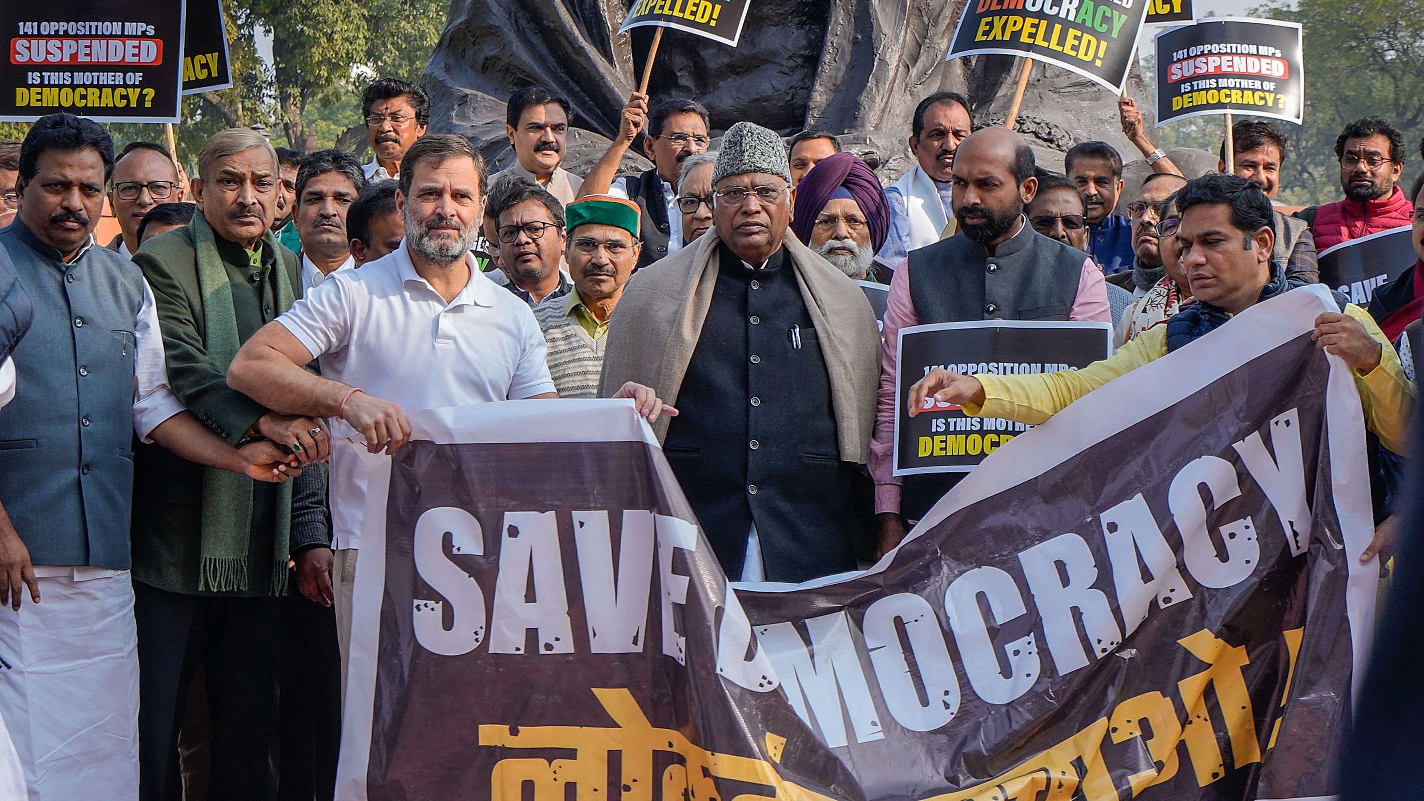 <div class="paragraphs"><p>Congress President Mallikarjun Kharge with party leader Rahul Gandhi and other opposition leaders during a protest over the suspension of MPs amid the Winter session of Parliament, in New Delhi, Wednesday, Dec. 20, 2023.</p></div>