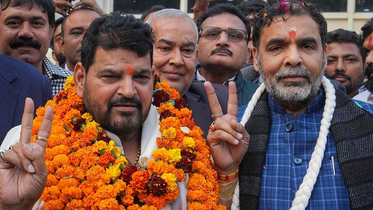 <div class="paragraphs"><p>BJP MP Brij Bhushan Sharan Singh with the newly-elected president of the Wrestling Federation of India (WFI) Sanjay Singh.</p></div>