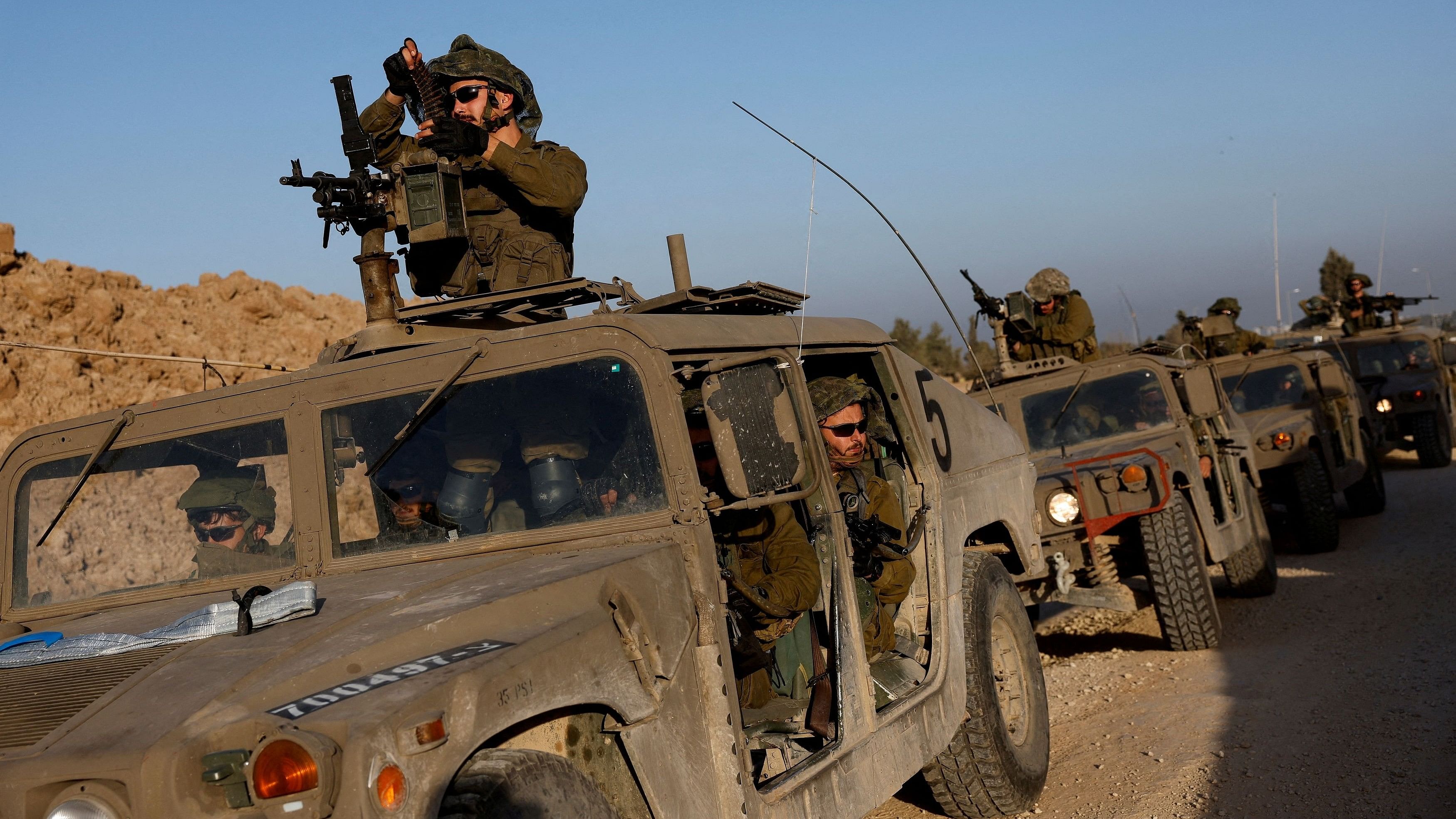 <div class="paragraphs"><p>Israeli soldiers prepare to enter Gaza, amid the ongoing conflict between Israel and the Palestinian Islamist group Hamas, on the Israeli side of the Israel-Gaza border.</p></div>