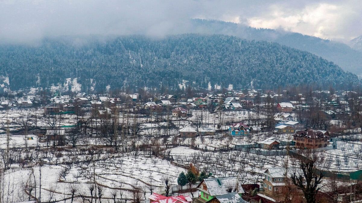 <div class="paragraphs"><p>A view of a snow-covered village after a fresh snowfall, in Tangmarg, Jammu and Kashmir.</p></div>