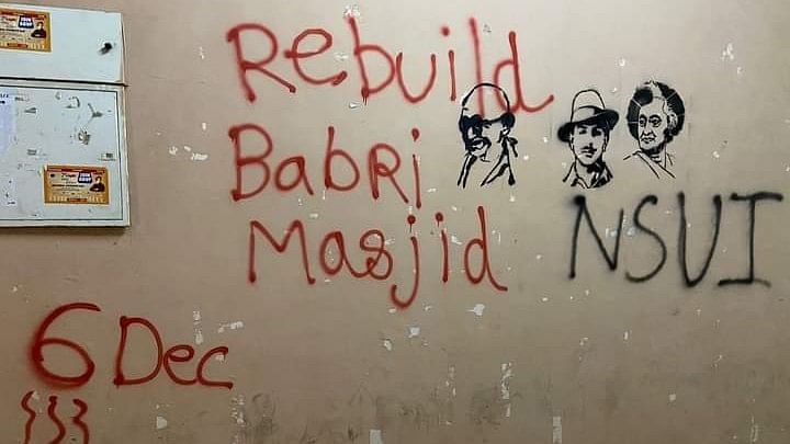 <div class="paragraphs"><p>JNU wall sprayed with message calling for rebuilding of Babri Masjid.</p></div>