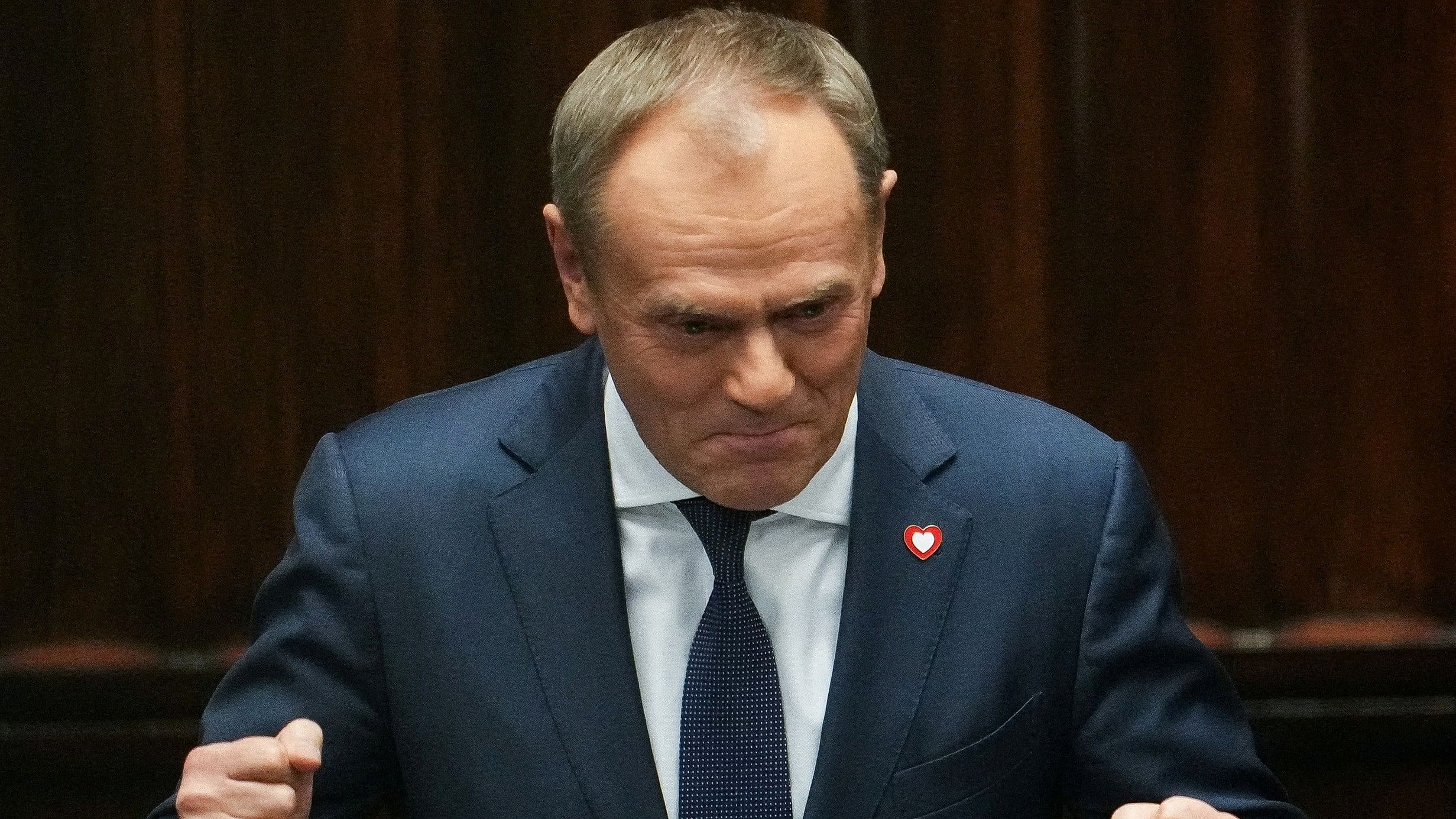 <div class="paragraphs"><p>Leader of the Civic Coalition  Donald Tusk gestures after the Parliament voted in favor of him becoming the Prime Minister, in Parliament, in Warsaw, Poland.</p></div>