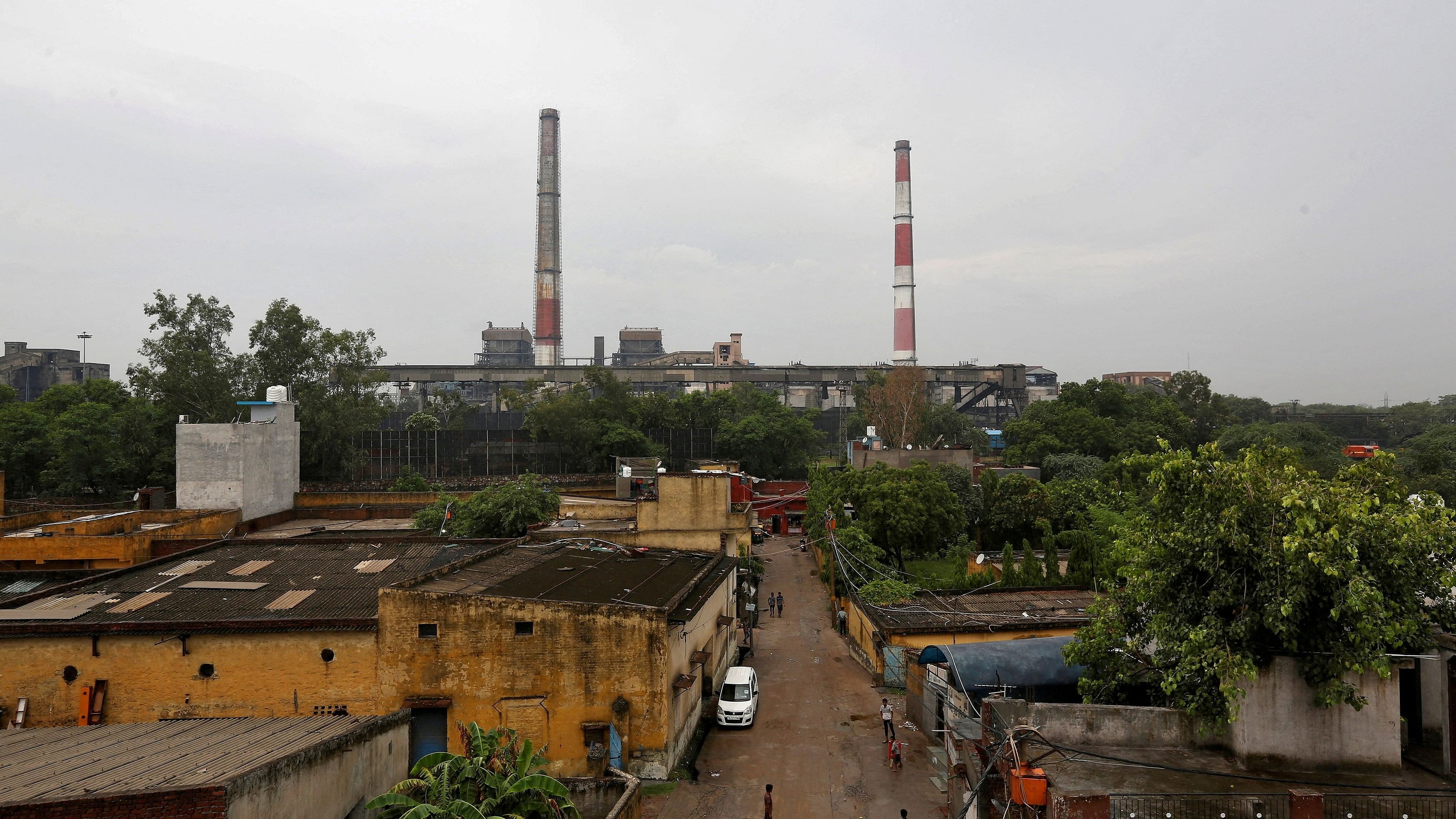 <div class="paragraphs"><p>Chimneys of a coal-fired power plant are pictured in New Delhi, India, July 20, 2017.</p></div>