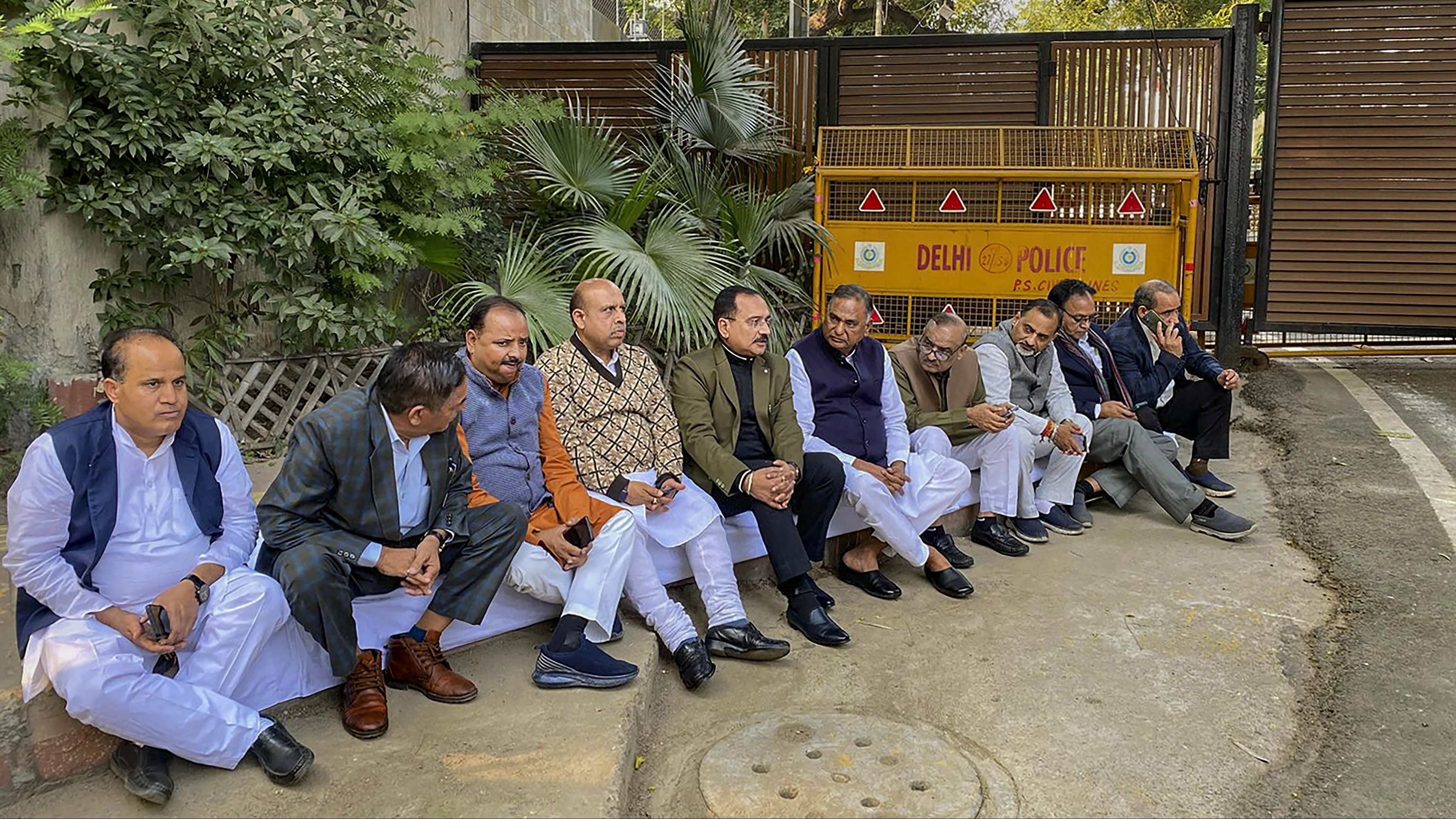 <div class="paragraphs"><p>Delhi BJP President Virendra Sachdeva with party MLAs during their protest near the residence of Delhi CM Arvind Kejriwal, in New Delhi, Sunday, Dec. 17, 2023. </p></div>