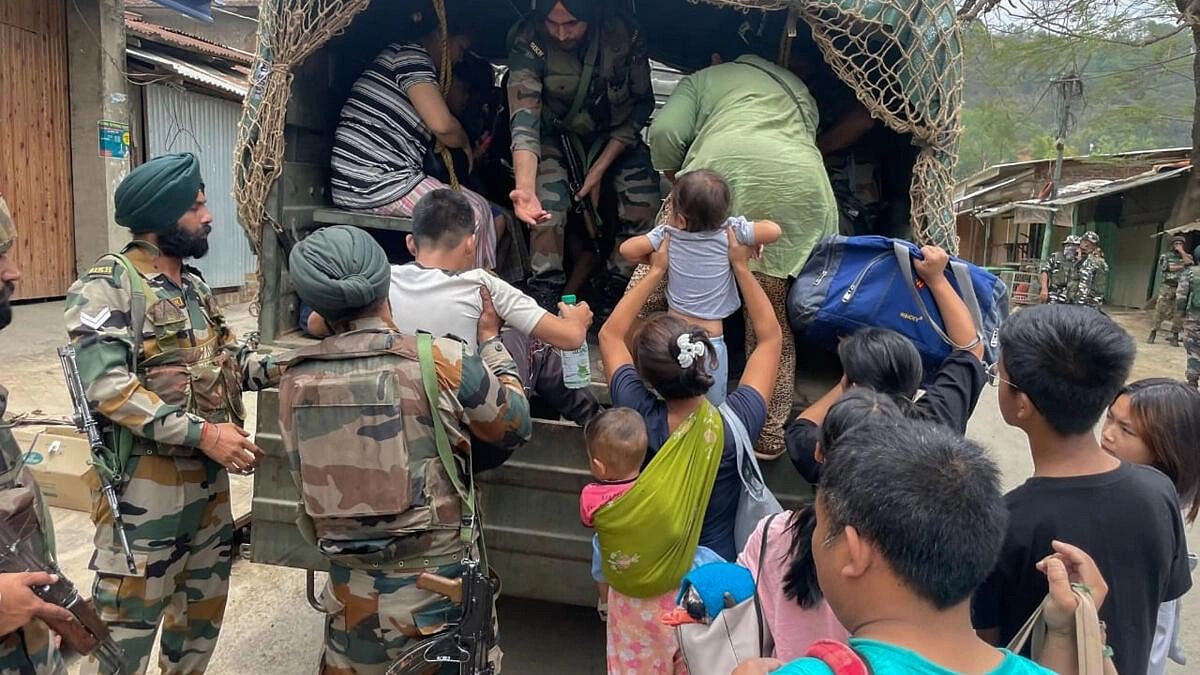 <div class="paragraphs"><p>Army personnel rescue people from a violence-hit area of Manipur.</p></div>