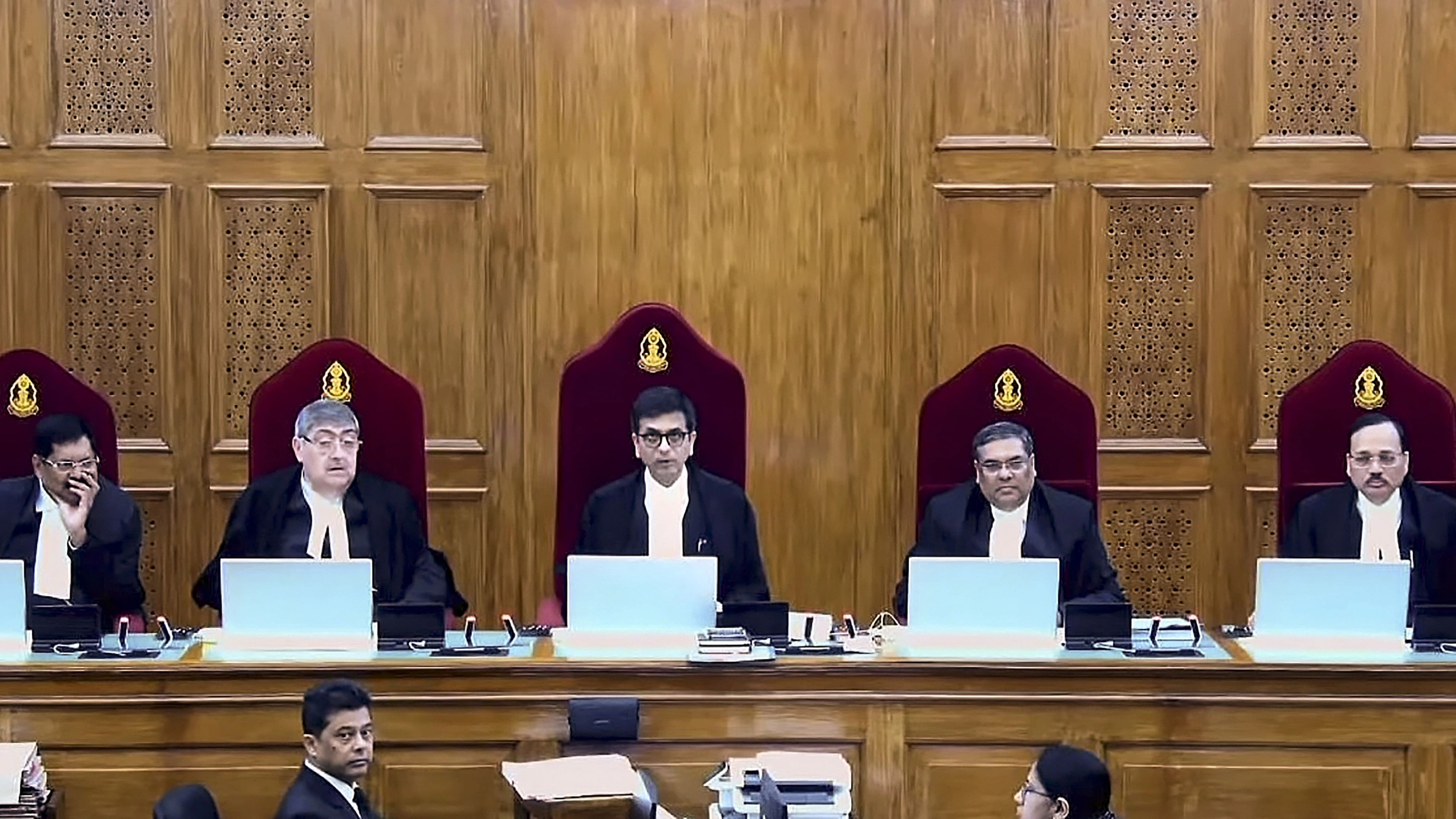 <div class="paragraphs"><p>The five-judge bench comprising Chief Justice DY Chandrachud and Justices Sanjay Kishan Kaul, Sanjiv Khanna, BR Gavai and Surya Kant during the pronouncement of the verdict on a batch of petitions challenging the abrogation of Article 370 of the Constitution, in New Delhi, Monday, Dec 11, 2023. </p></div>