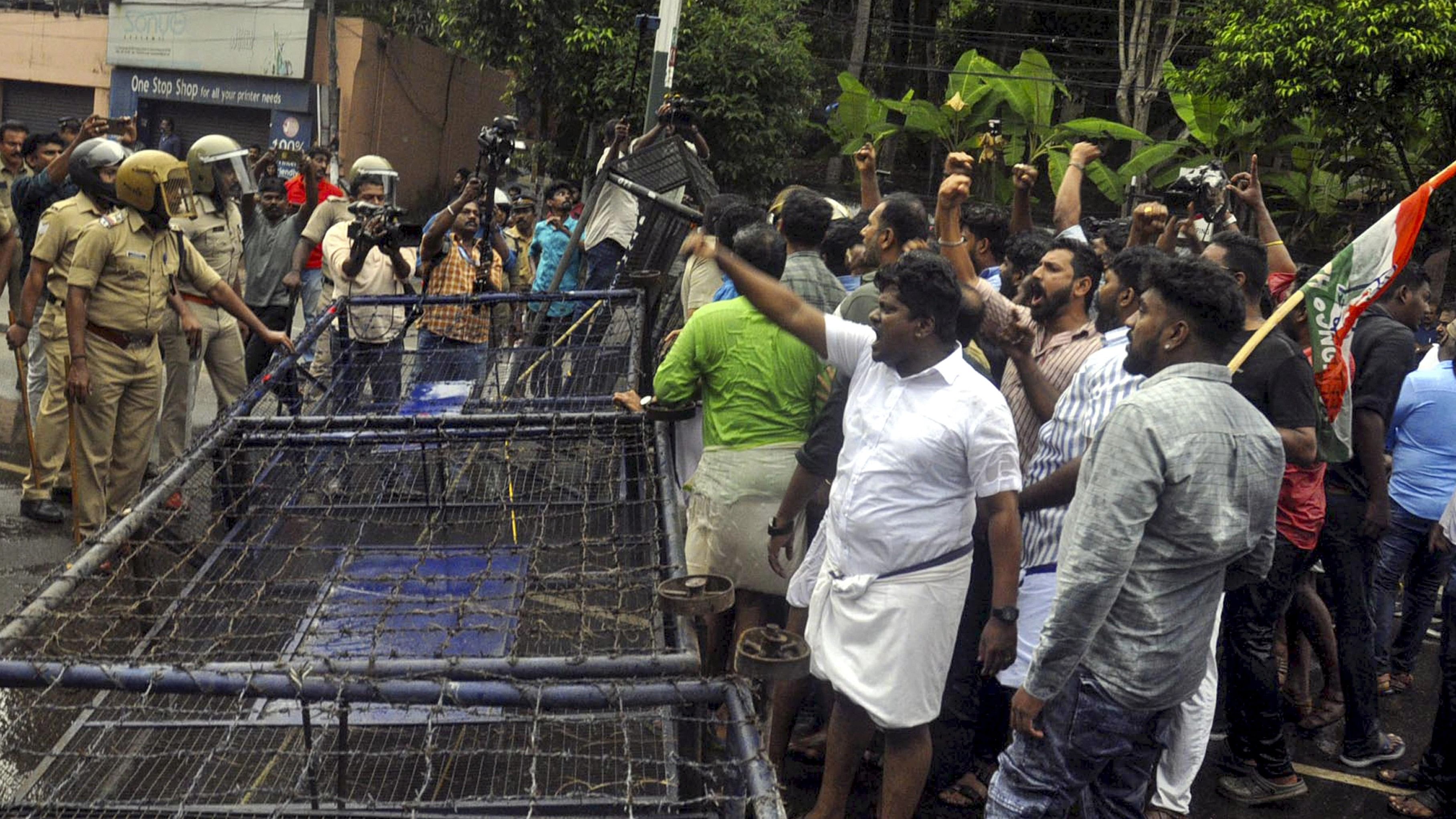 <div class="paragraphs"><p>Thiruvananthapuram: Youth Congress activists shout slogans during their protest march to the Kerala Chief Minister Pinarayi Vijayan's gunman residence, demanding his arrest for allegedly beating their colleagues, in Thiruvanathapuram, Saturday, Dec. 16, 2023. </p></div>