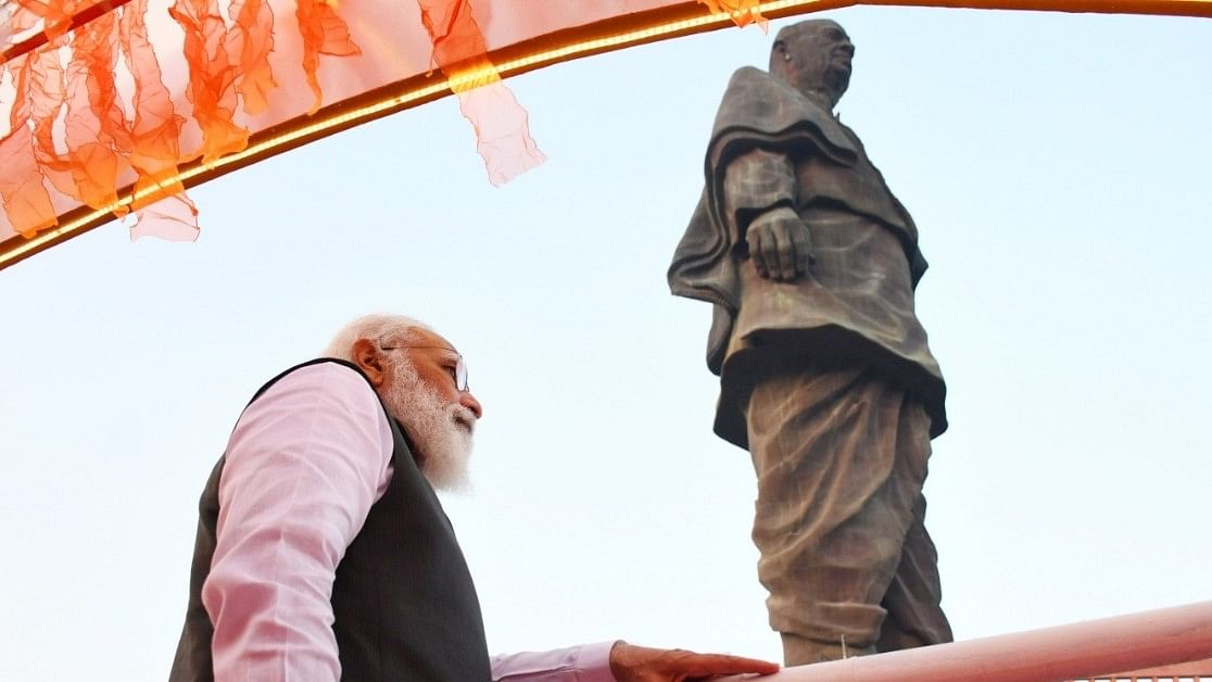 <div class="paragraphs"><p>File photo of Narendra Modi and Sardar Patel statue.</p></div>