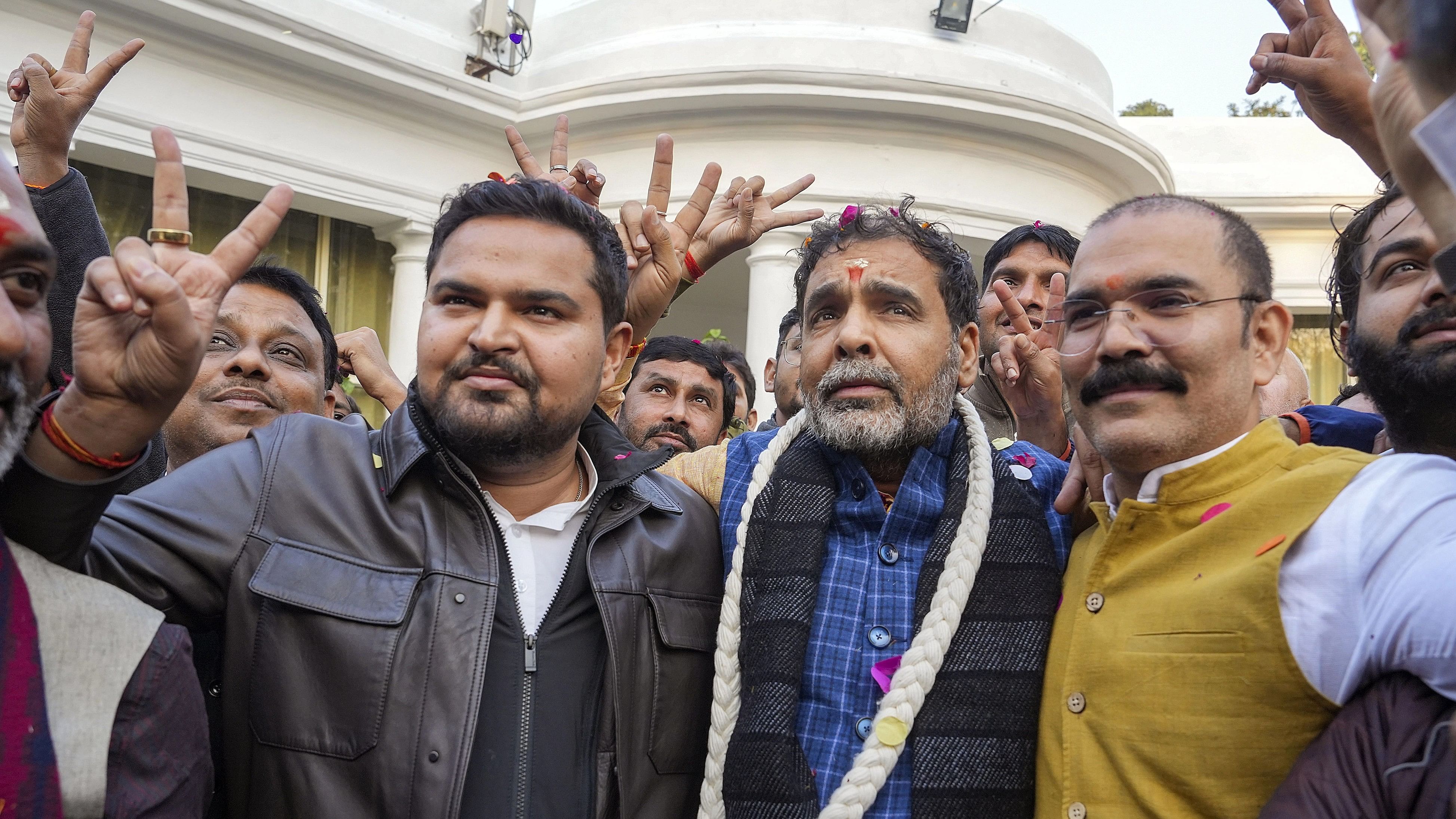 <div class="paragraphs"><p>The newly-elected president of the Wrestling Federation of India (WFI) Sanjay Singh with son of BJP MP Brij Bhushan Sharan Singh, BJP MLA from Gonda Prateek Bhushan Singh and others, in New Delhi, Thursday, Dec. 21, 2023. </p></div>