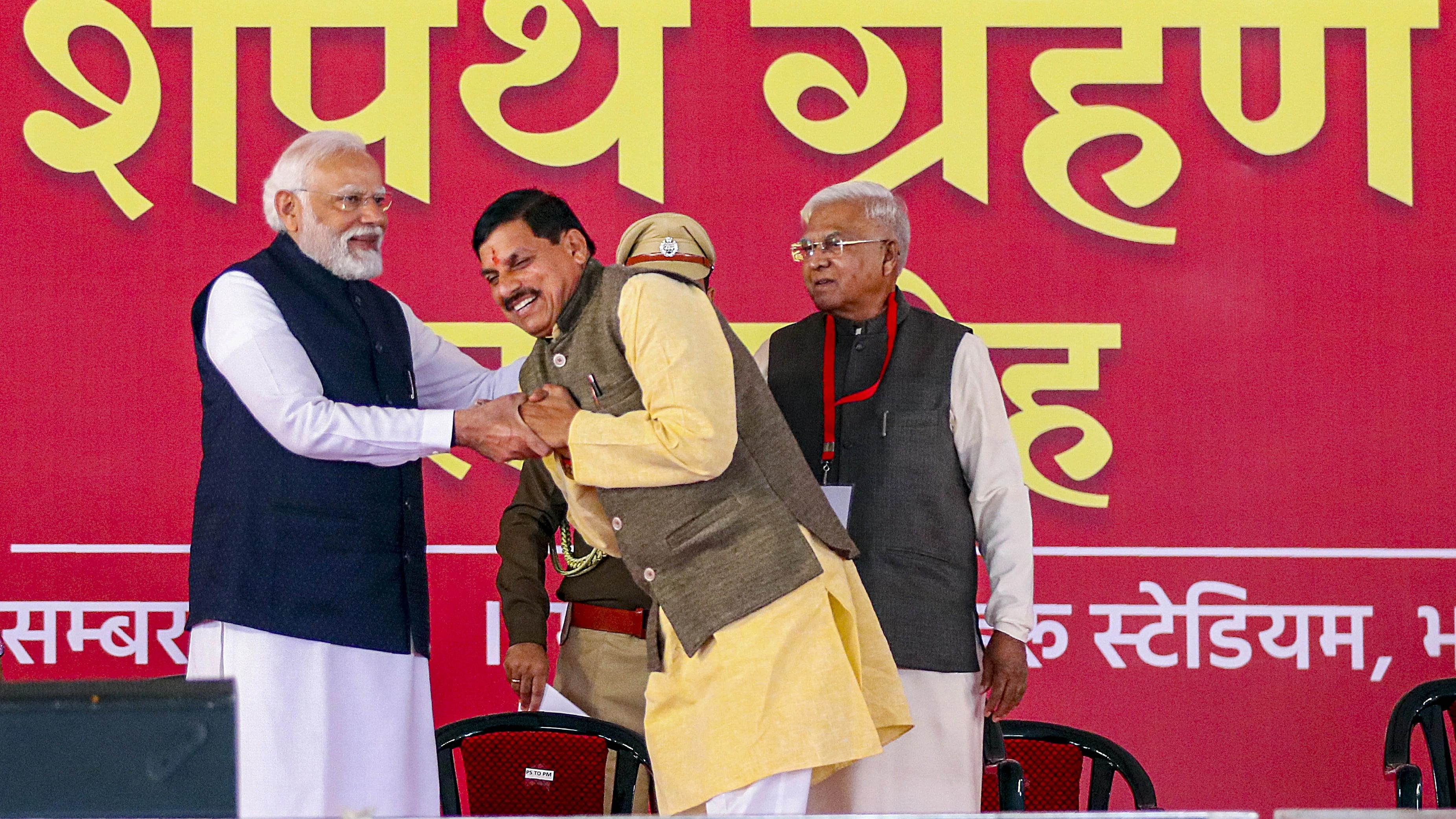 <div class="paragraphs"><p>Prime Minister Narendra Modi with Madhya Pradesh Chief Minister Mohan Yadav during the latter's swearing-in ceremony, in Bhopal, Wednesday, Dec 13, 2023. </p></div>
