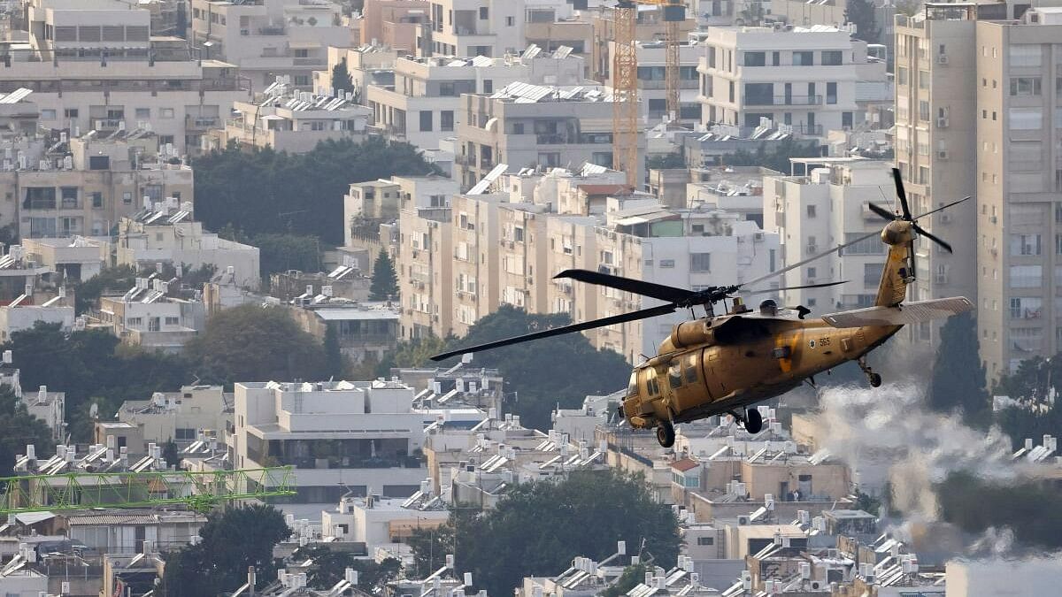 <div class="paragraphs"><p>A military helicopter flies over Tel Aviv after lifting off from the Tel Aviv Sourasky Medical Center (Ichilov), amid the ongoing conflict between Israel and the Palestinian Islamist group Hamas, Israel, December 27, 2023. </p></div>