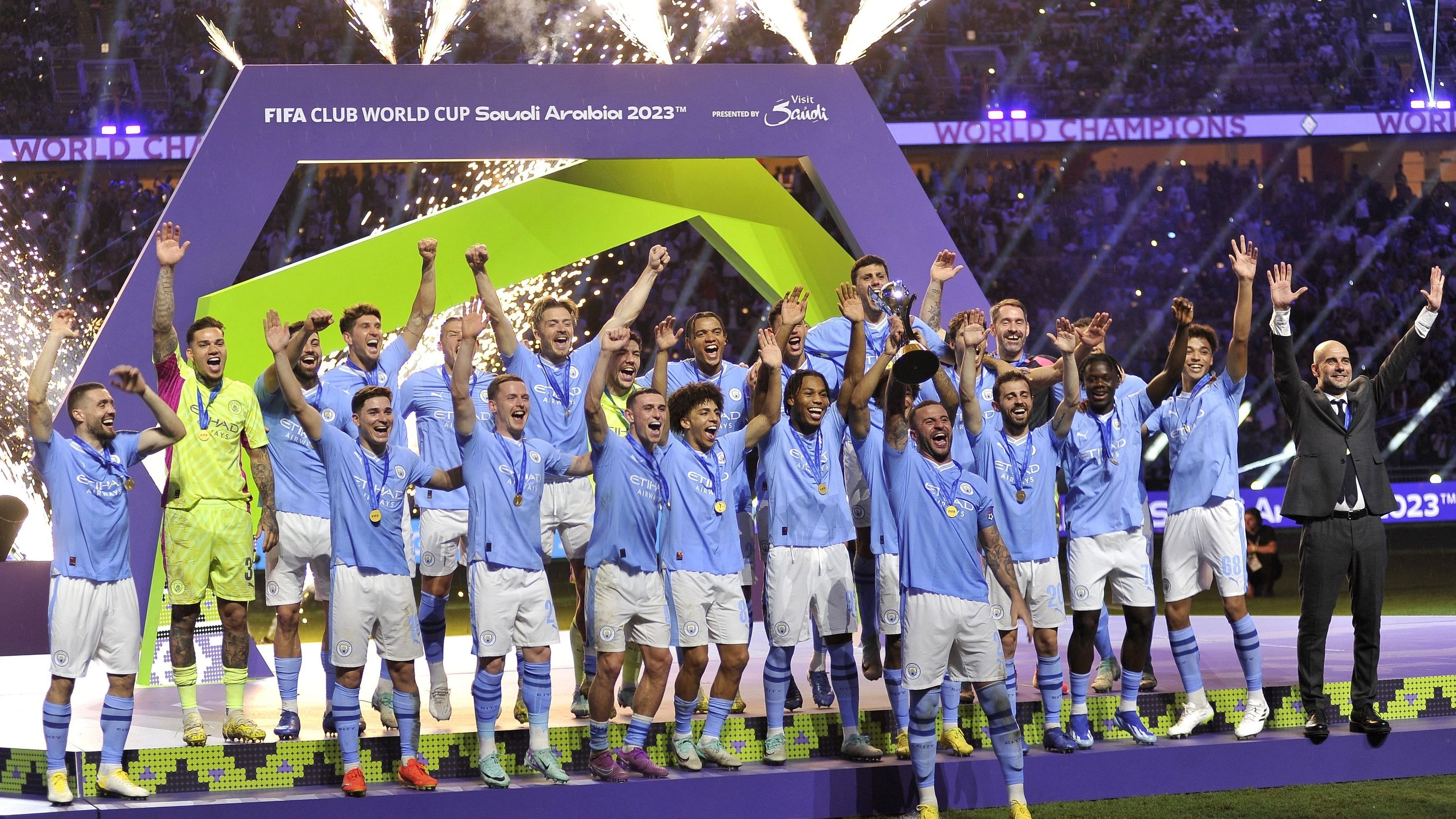 <div class="paragraphs"><p>Manchester City's Kyle Walker lifts the trophy alongside teammates after winning the Club World Cup final </p></div>