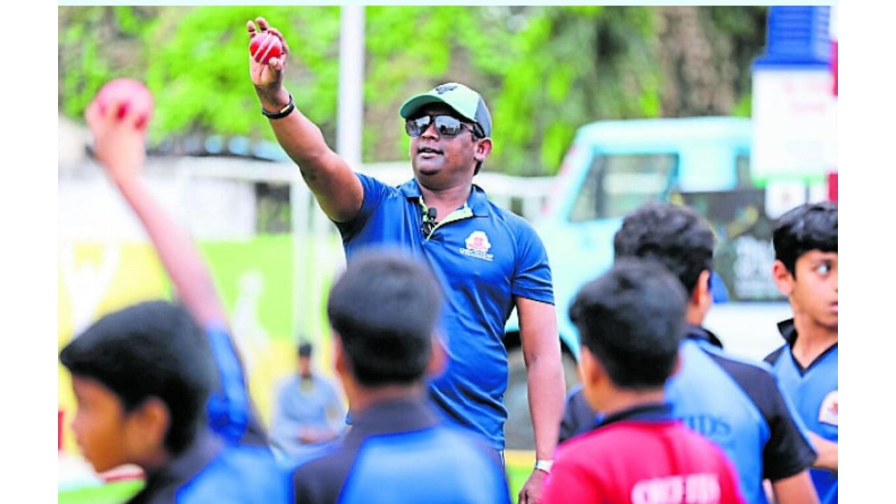 <div class="paragraphs"><p>Ajantha Mendis imparting some spin bowling techniques to young aspirants at the Orchids, the International School in Bengaluru. </p><p><br></p></div>