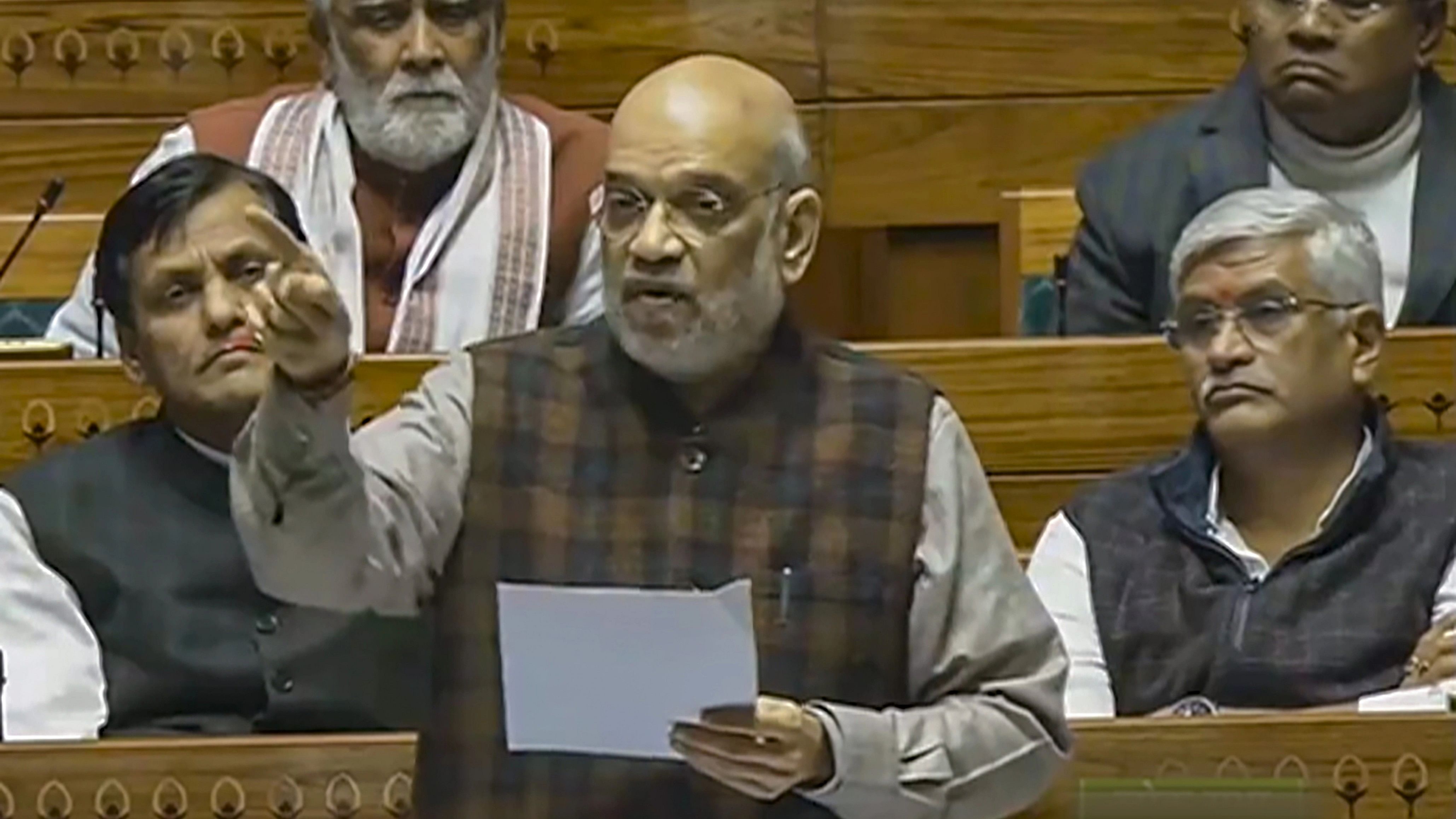 <div class="paragraphs"><p>Union Home Minister Amit Shah speaks in the Lok Sabha during the Winter session of Parliament, in New Delhi, Wednesday, Dec. 20, 2023.</p></div>