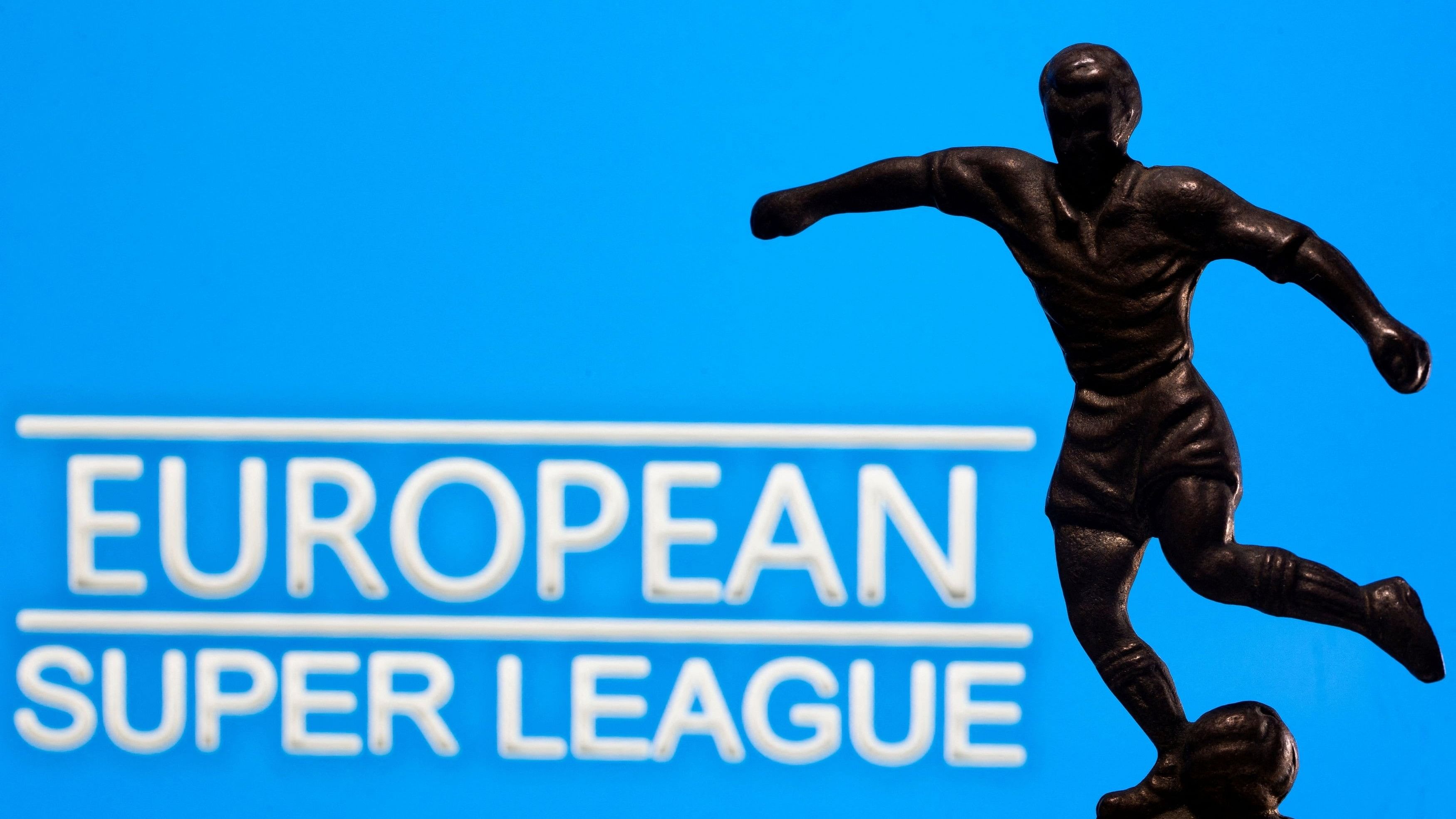 <div class="paragraphs"><p>A metal figure of a football player with a ball is seen in front of the words "European Super League" in this illustration taken April 20, 2021. </p></div>