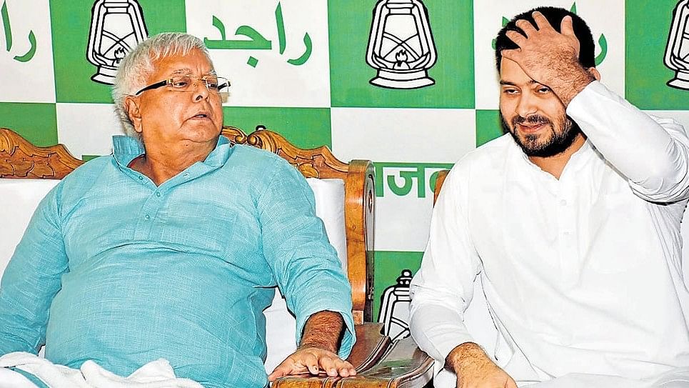 <div class="paragraphs"><p>RJD leader Lalu Prasad Yadav and his son Tejashwi Yadav. </p></div>