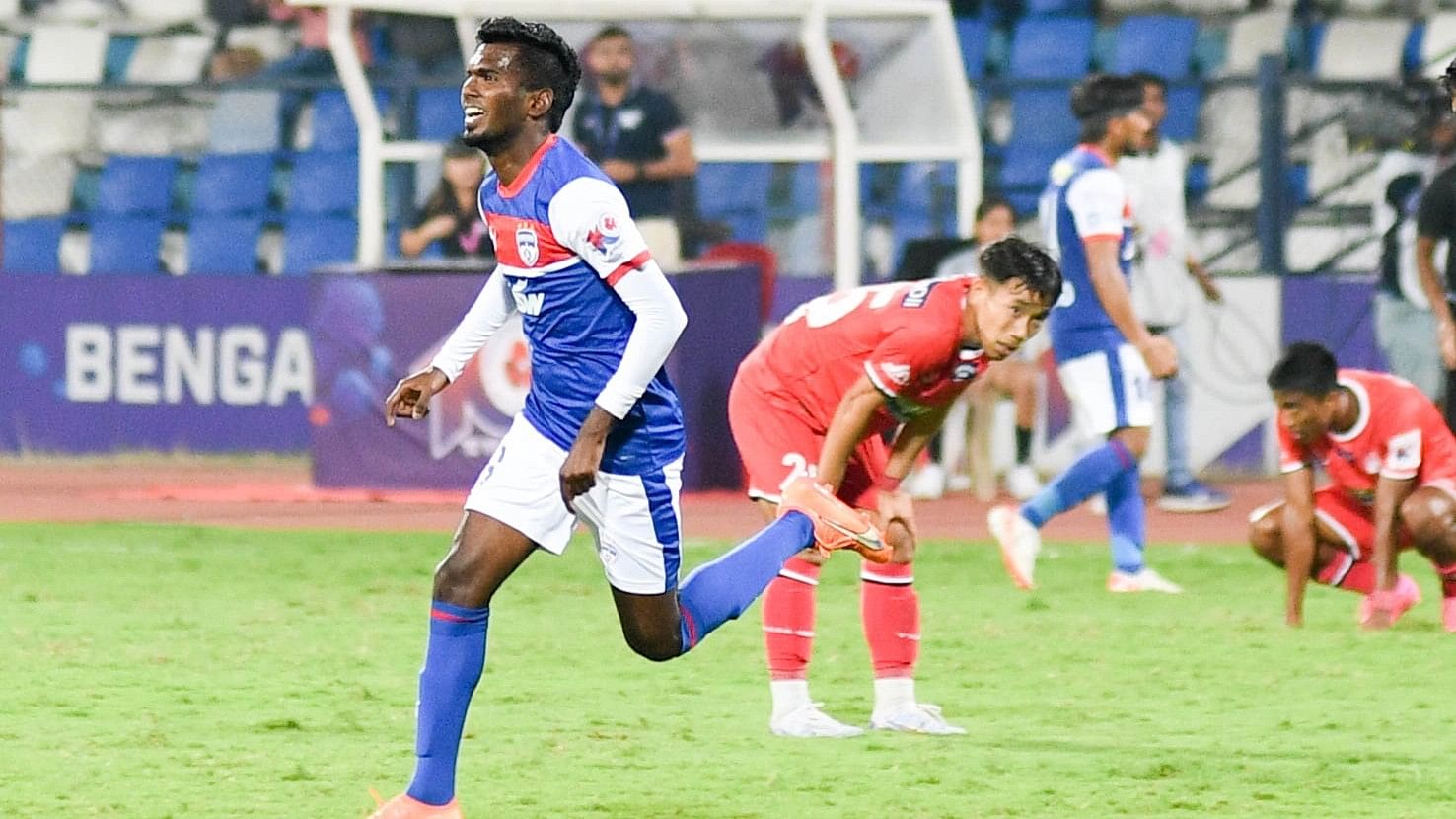 <div class="paragraphs"><p>Sivasakthi N (left) celebrates scoring BFC’s lone goal against NorthEast United FC at the Sree Kanteerava stadium in Bengaluru on Sunday. </p></div>