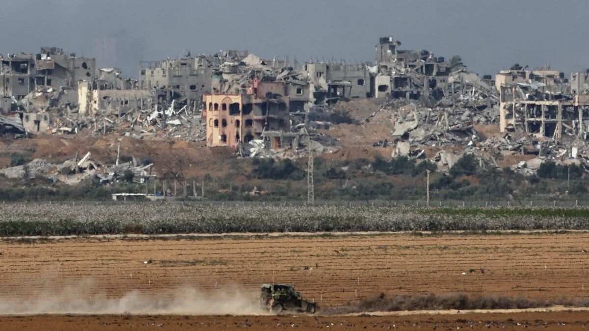 <div class="paragraphs"><p>An Israeli military vehicle operates, amid the ongoing conflict between Israel and the Palestinian Islamist group Hamas, near the Israel-Gaza border, as seen from southern Israel, December 9, 2023.</p></div>