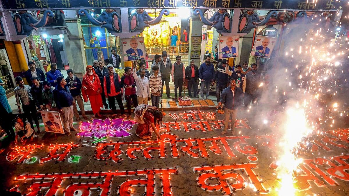 <div class="paragraphs"><p>BJP workers celebrate the party's victory in elections to the Legislative Assemblies of Madhya Pradesh, Rajasthan and Chhattisgarh, in Bhopal, Monday, Dec. 4, 2023.</p></div>