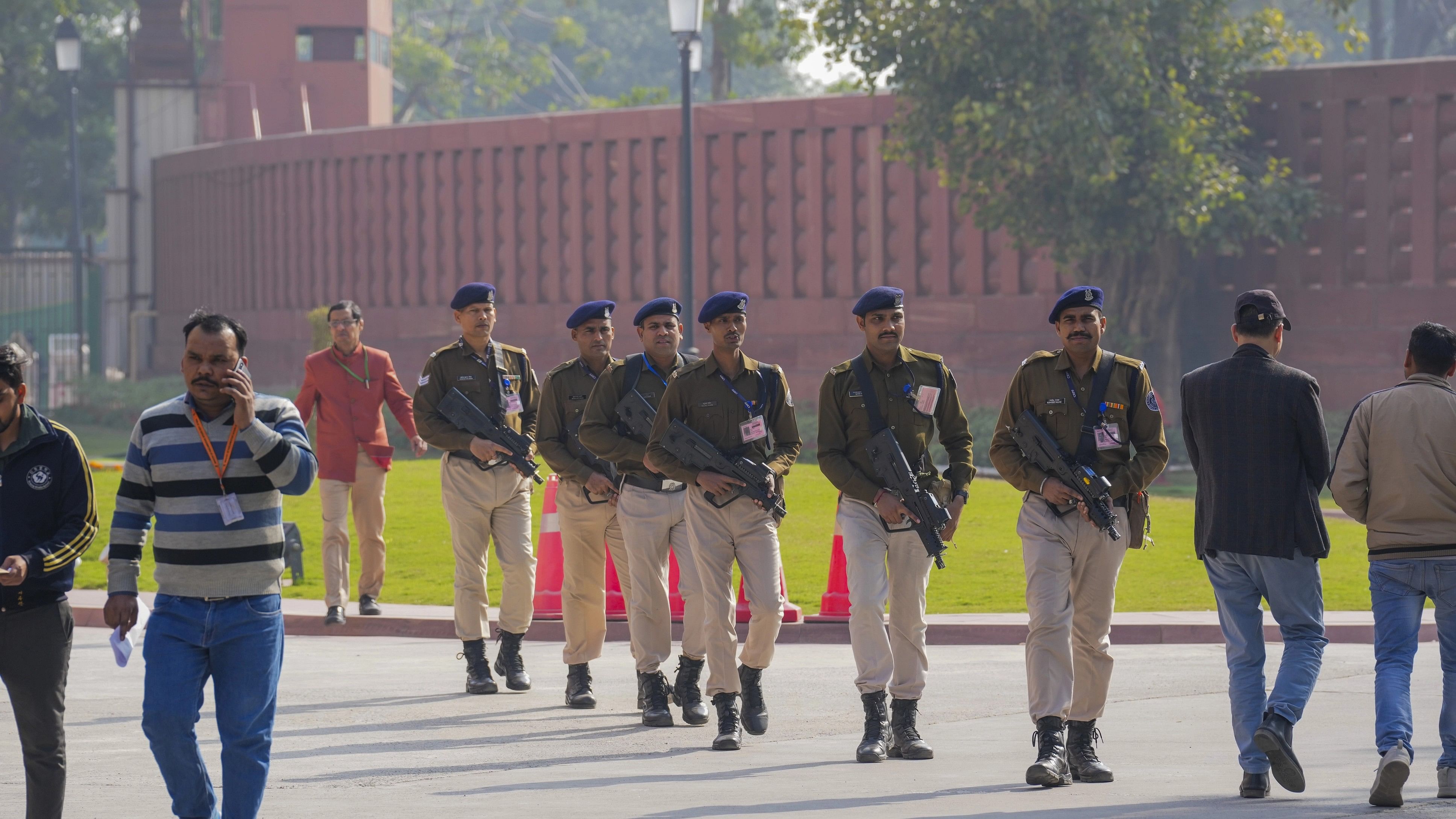 <div class="paragraphs"><p> Armed security personnel patrol the Parliament House premises after a recent security breach.</p></div>