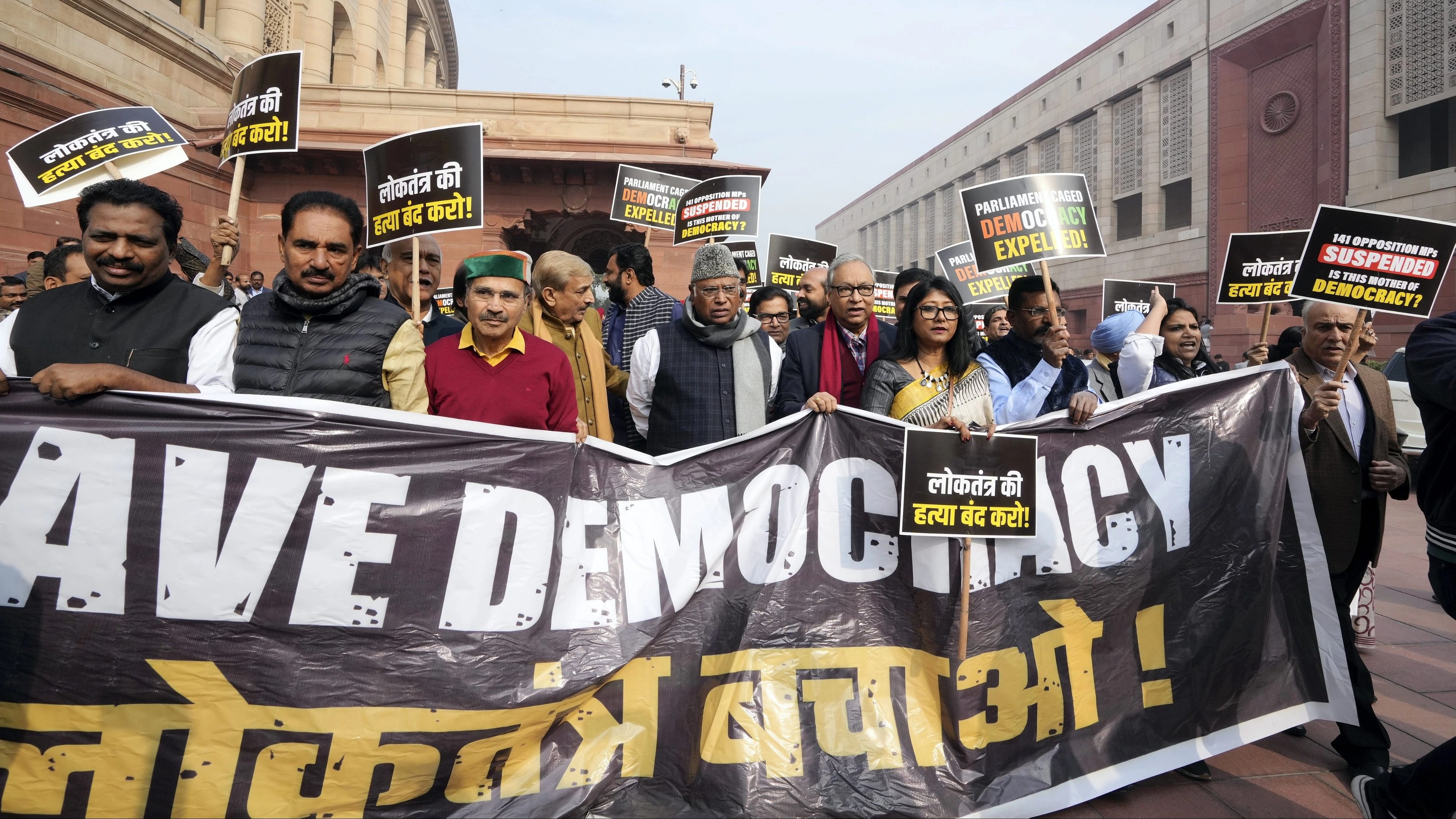 <div class="paragraphs"><p>Leader of Opposition in the Rajya Sabha Mallikarjun Kharge with suspended opposition MPs during a protest over their suspension at Mahatma Gandhi statue amid the Winter session of Parliament, in New Delhi.</p></div>