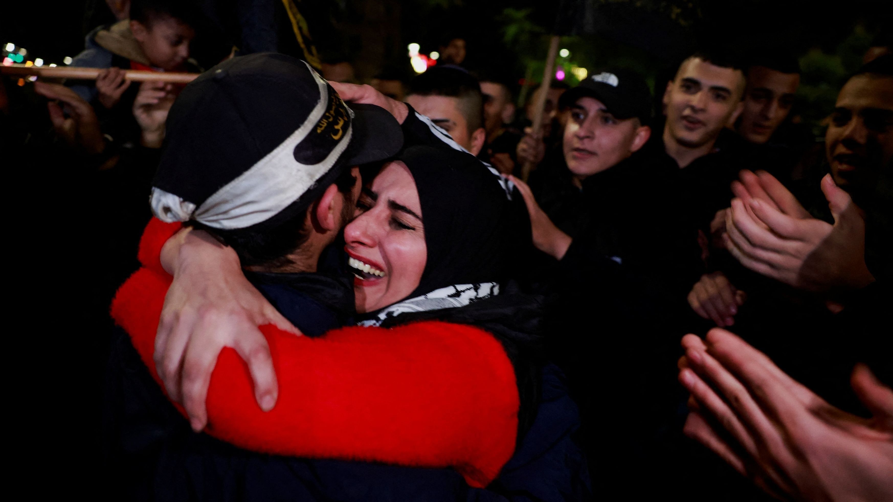 <div class="paragraphs"><p>A Palestinian prisoner hugs his mother after being released amid a hostages-prisoners swap deal between Hamas and Israel, in Ramallah, in the Israeli-occupied West Bank, December 1, 2023. </p></div>