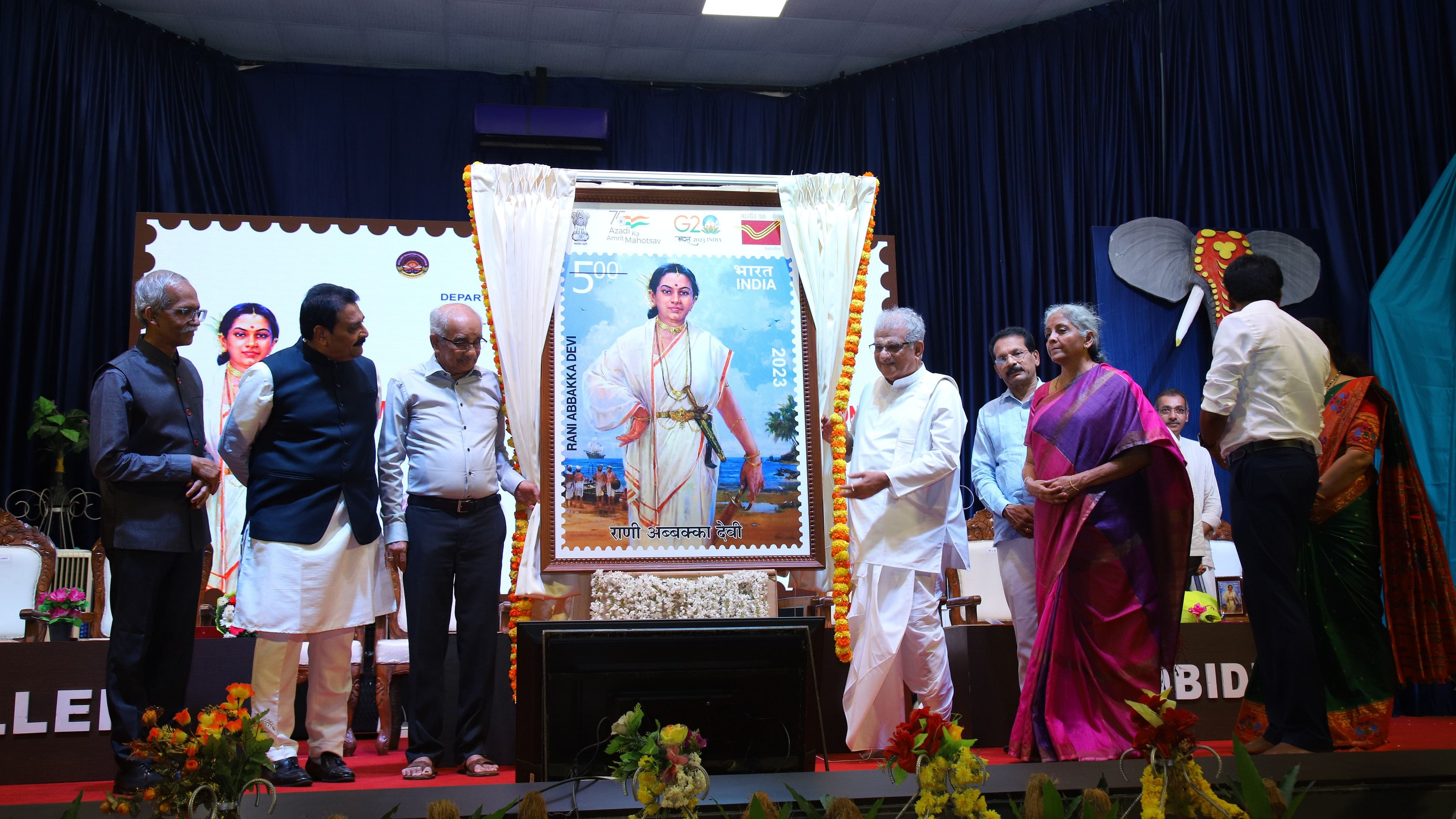 <div class="paragraphs"><p>Union Minister for Finance and Corporate Affairs Nirmala Sitharaman, Rajya Sabha member D Veerendra Heggade and other dignitaries release a commemorative postage stamp of unsung brave woman Rani Abbakka Devi at a programme organised at Excellent College in Moodbidri on Friday.</p></div>