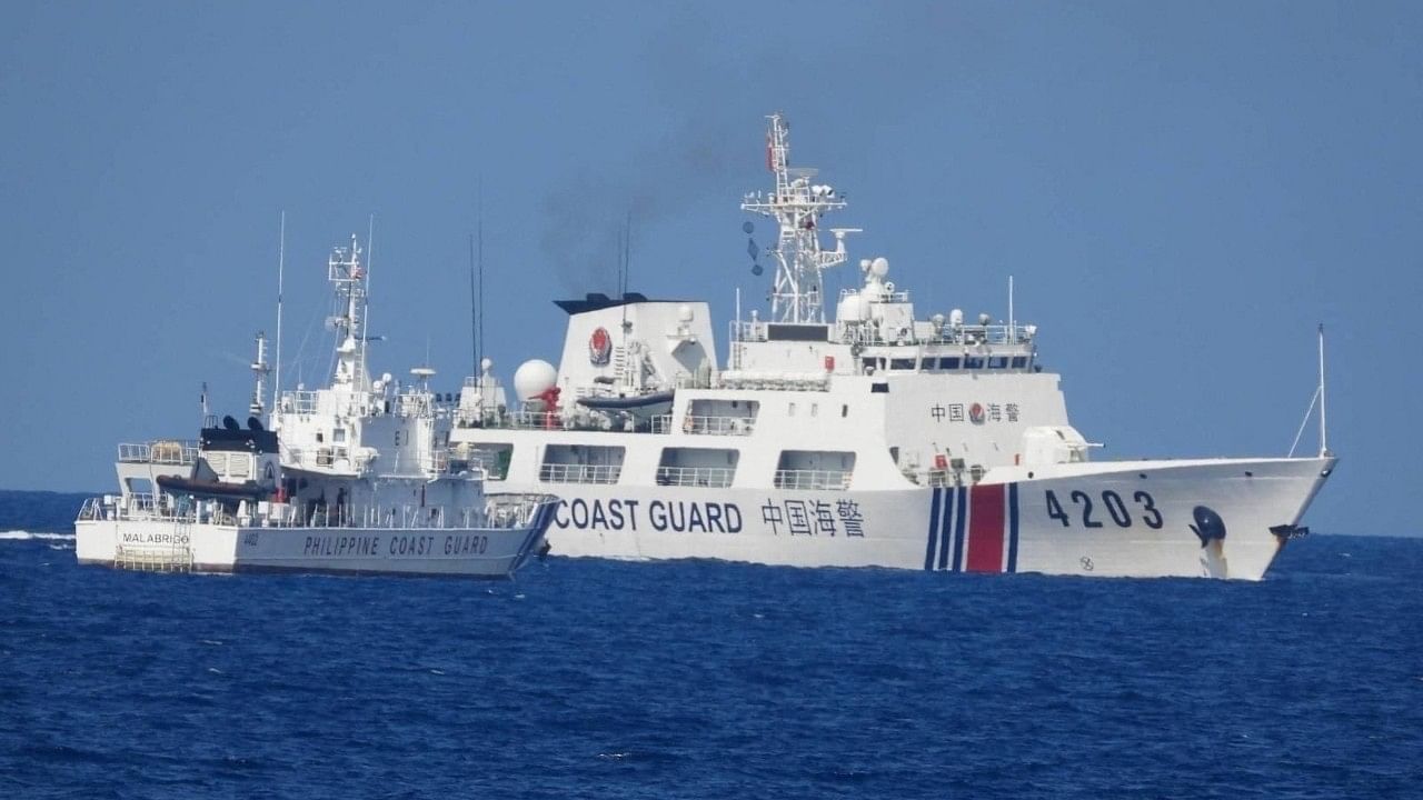 <div class="paragraphs"><p>A Chinese Coast Guard ship allegedly obstructs the Philippine Coast Guard vessel Malabrigo as it provided support during a Philippine Navy operation near Second Thomas Shoal in the disputed South China Sea.</p></div>