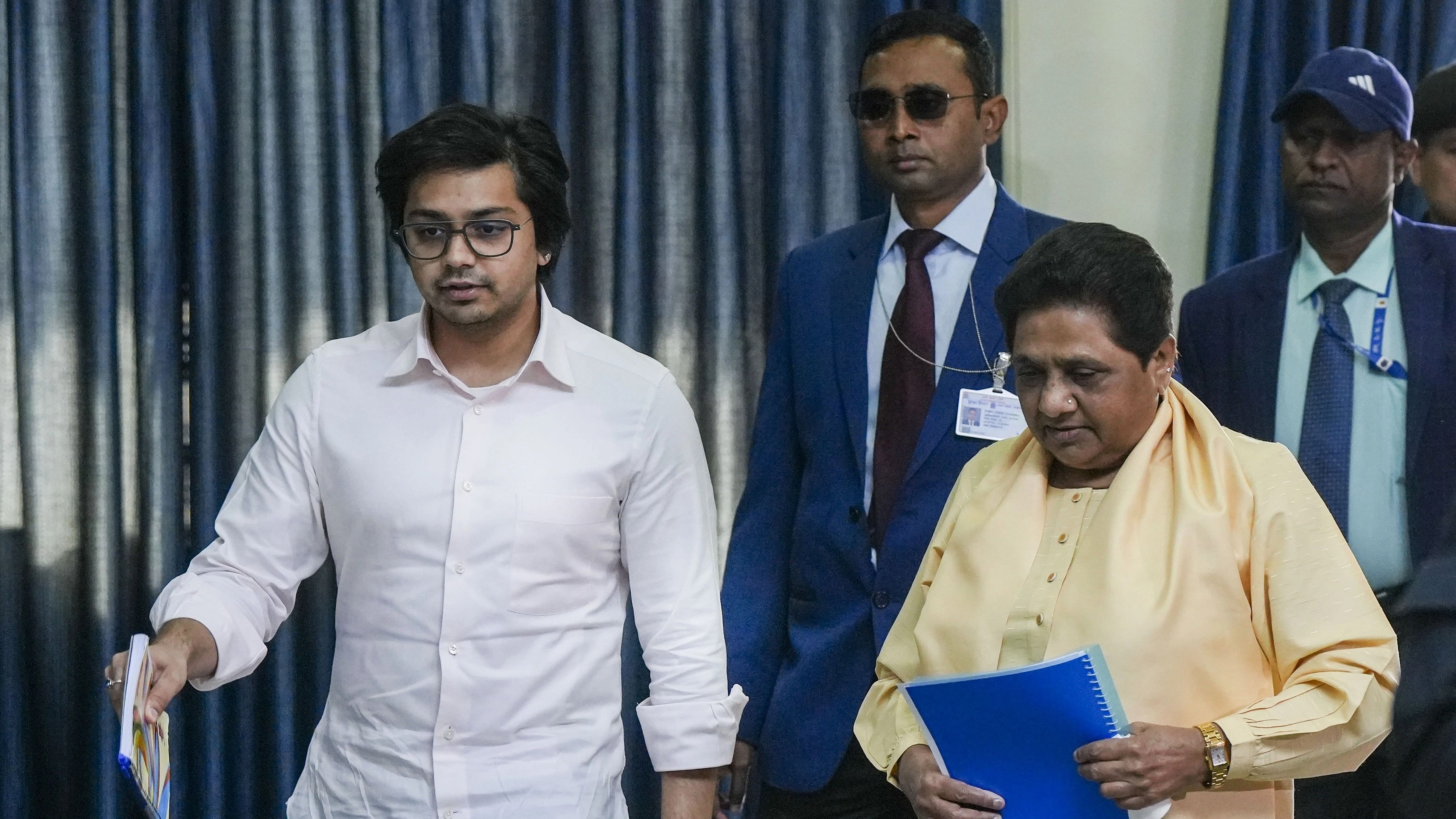 <div class="paragraphs"><p>Bahujan Samaj Party (BSP) supremo Mayawati with her nephew Akash Anand arrives for a meeting of party's office bearers ahead of the 2024 Lok Sabha elections, at the party office in Lucknow, Sunday, Dec. 10, 2023. </p></div>