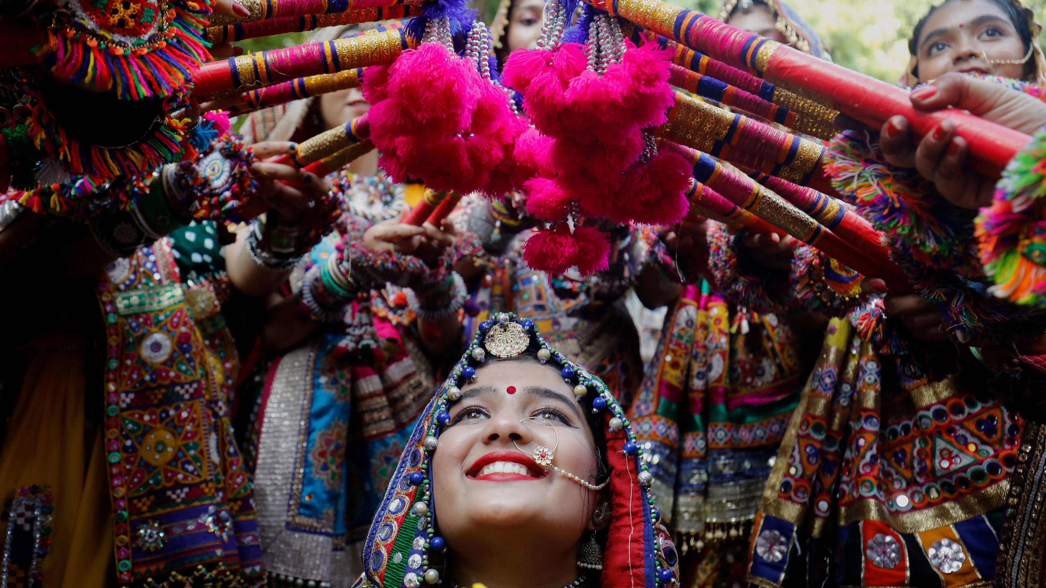 <div class="paragraphs"><p>Participants dressed in traditional attire pose for a picture during rehearsals for Garba, October 9, 2023.</p></div>