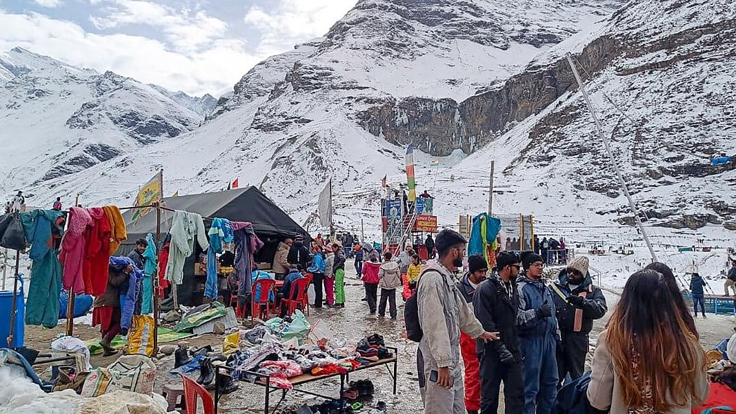 <div class="paragraphs"><p>Tourists visit the north portal of Atal Tunnel ahead of the Christmas and New Year celebrations, in Manali, Sunday, Dec. 24, 2023.</p></div>