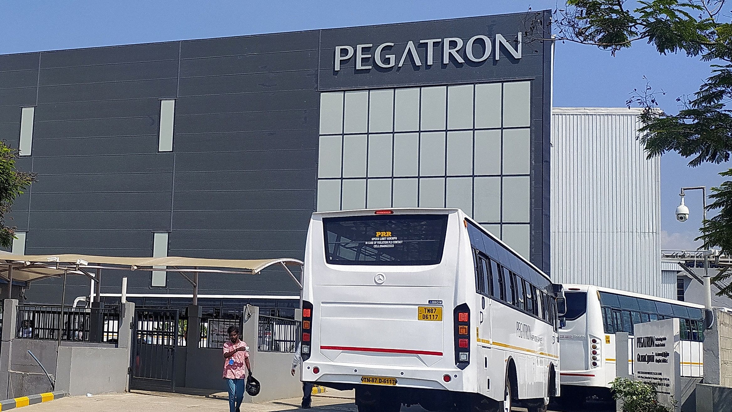 <div class="paragraphs"><p>Employee buses enter the Pegatron facility near Chennai, India, March 7, 2023.</p></div>