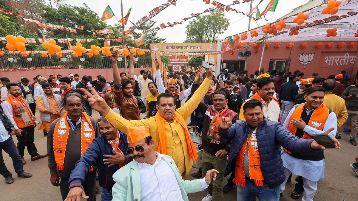 <div class="paragraphs"><p>BJP workers and supporters outside the party headquarters during counting of votes for the Rajasthan Assembly elections, in Jaipur, Sunday, Dec. 3.</p></div>