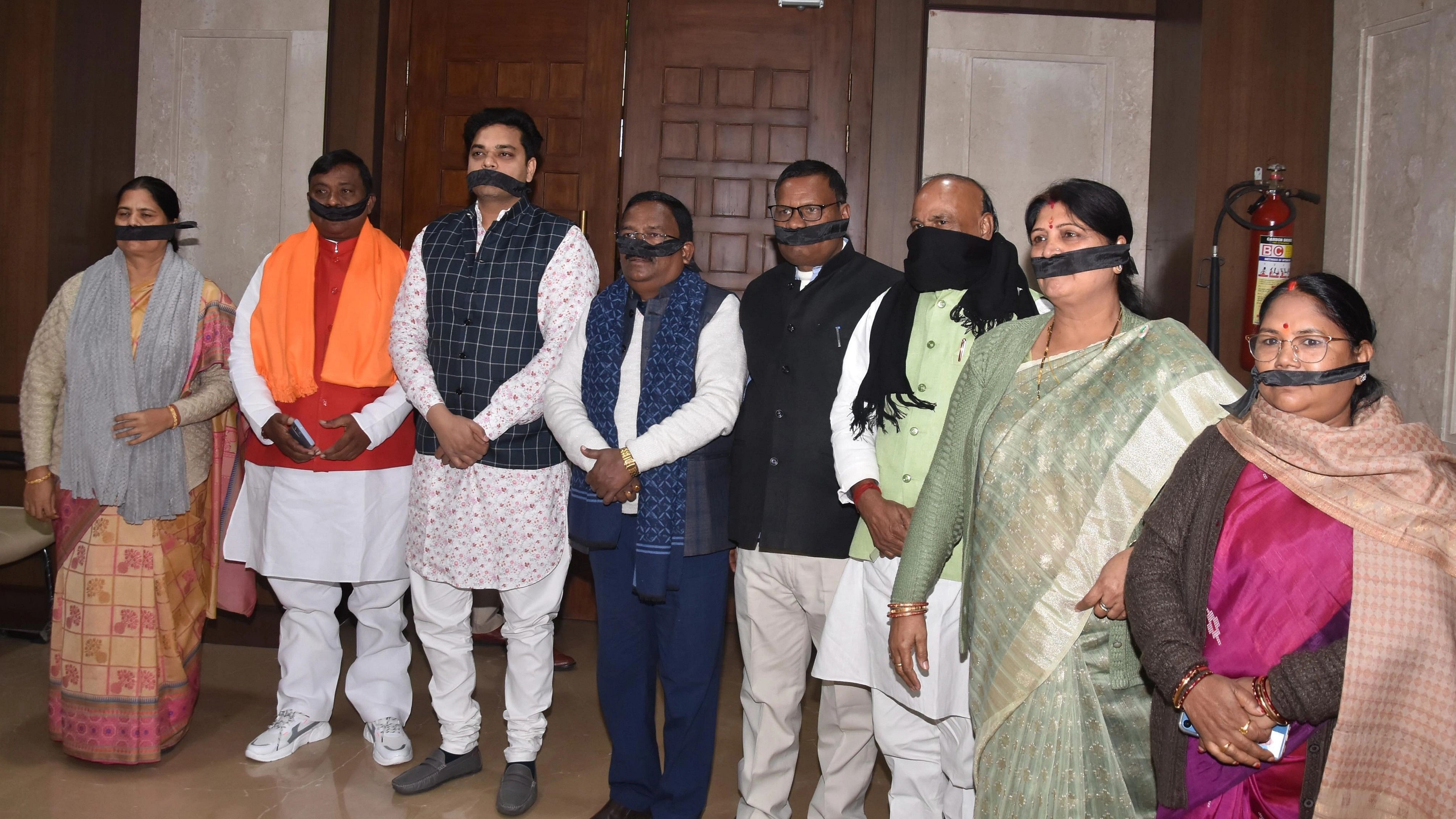 <div class="paragraphs"><p>BJP MLAs stage a protest against Jharkhand Chief Minister Hemant Soren during the Winter session of Jharkhand Assembly, in Ranchi, Wednesday, Dec. 20, 2023</p></div>