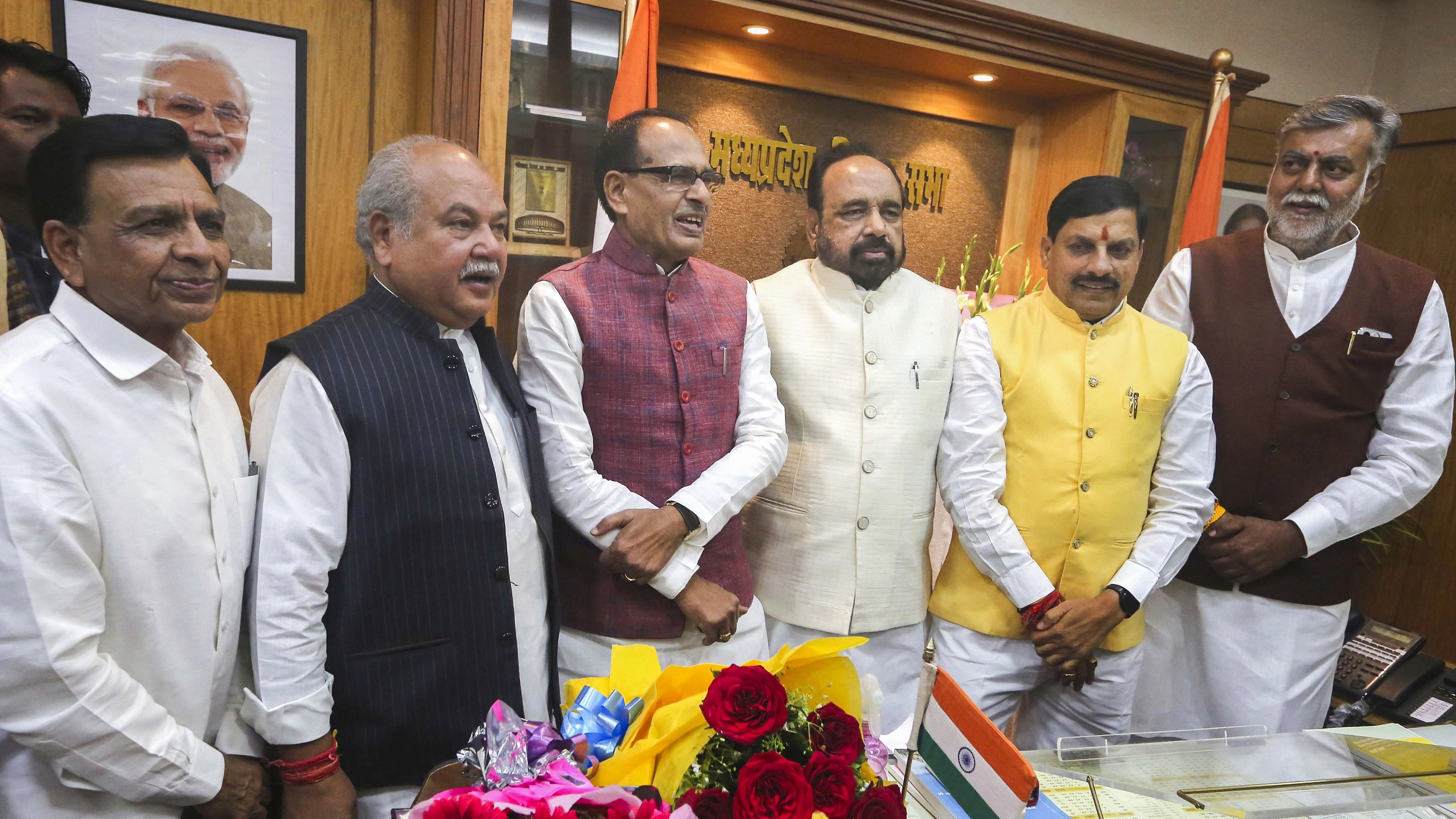 <div class="paragraphs"><p>Madhya Pradesh CM Mohan Yadav with his deputies Rajendra Shukla and Jagdish Devda, State Assembly Pro-tem Speaker Gopal Bhargava, BJP MLAs Narendra Singh Tomar, Shivraj Singh Chouhan and Prahlad Patel on the first day of the Winter session of MP Assembly, in Bhopal.</p></div>